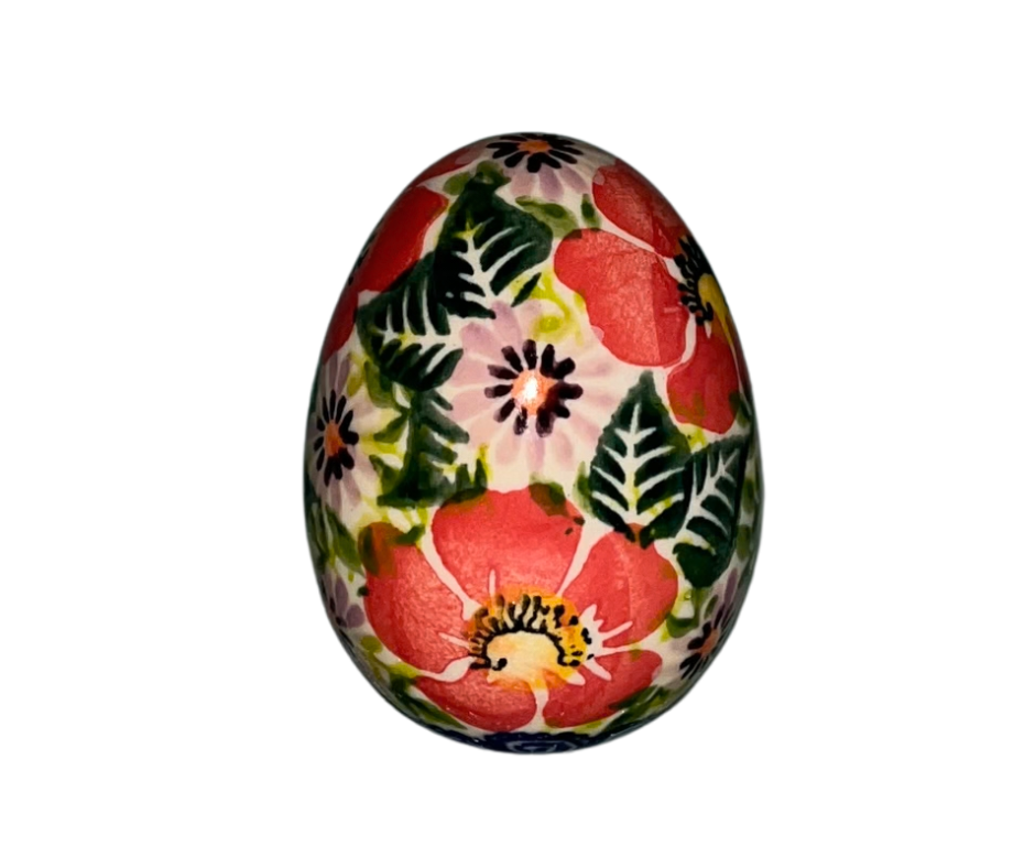 Handcrafted Ceramika Kalich 3-inch ceramic egg featuring coral flowers, lavender blossoms, and green leaves. A colorful Polish folk-style decorative egg perfect for Easter or spring décor.