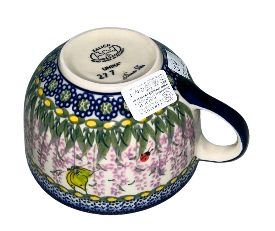 Ceramika Kalich Pattern 277 Lavender Polish pottery featuring hand-painted lavender flowers, butterflies, and ladybugs. Durable stoneware that is dishwasher, microwave, and oven safe.