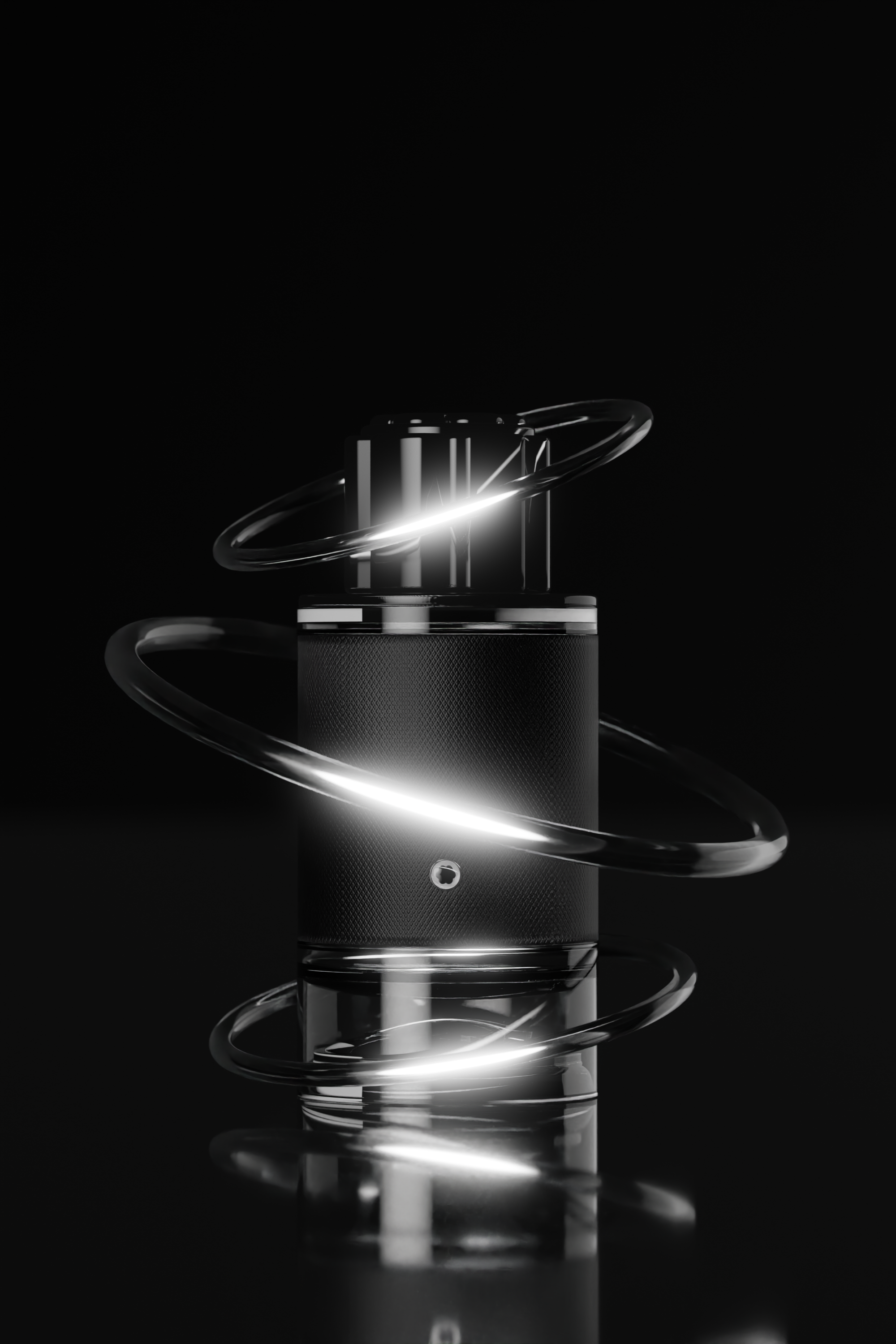 Black perfume bottle with metallic rings on dark background