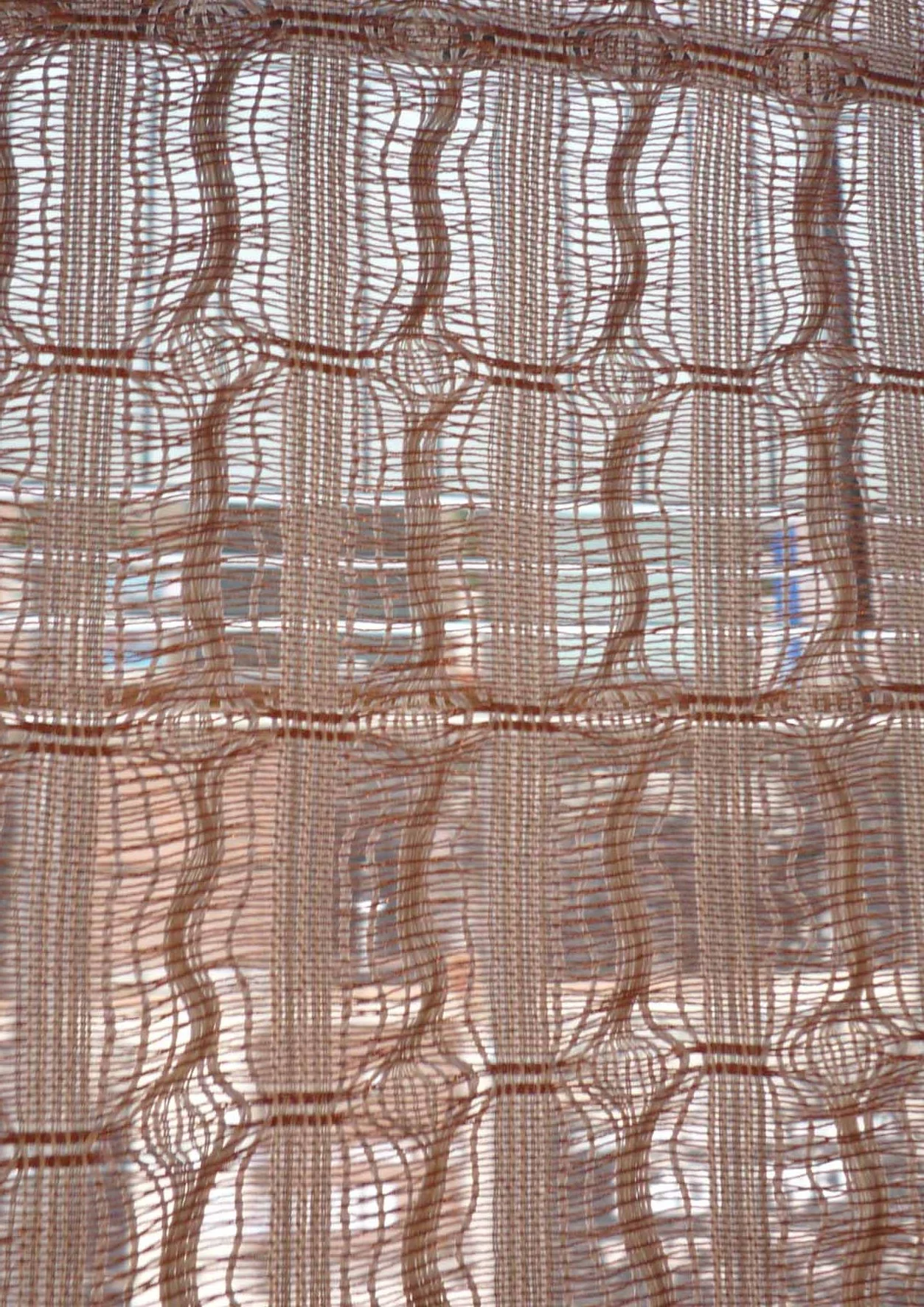 copper metallic thread at window.jpg
