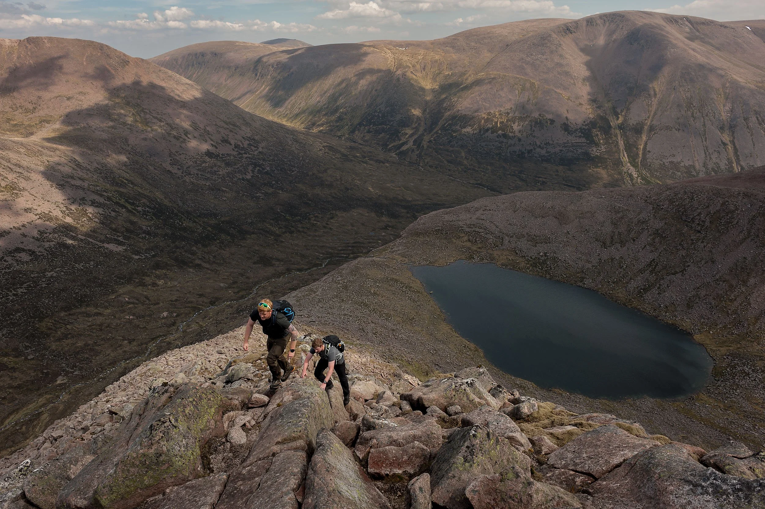 Scrambling on the north-east ridge of Angel's Peak (Sgòr an Lochain Uaine) in the Cairngorms.