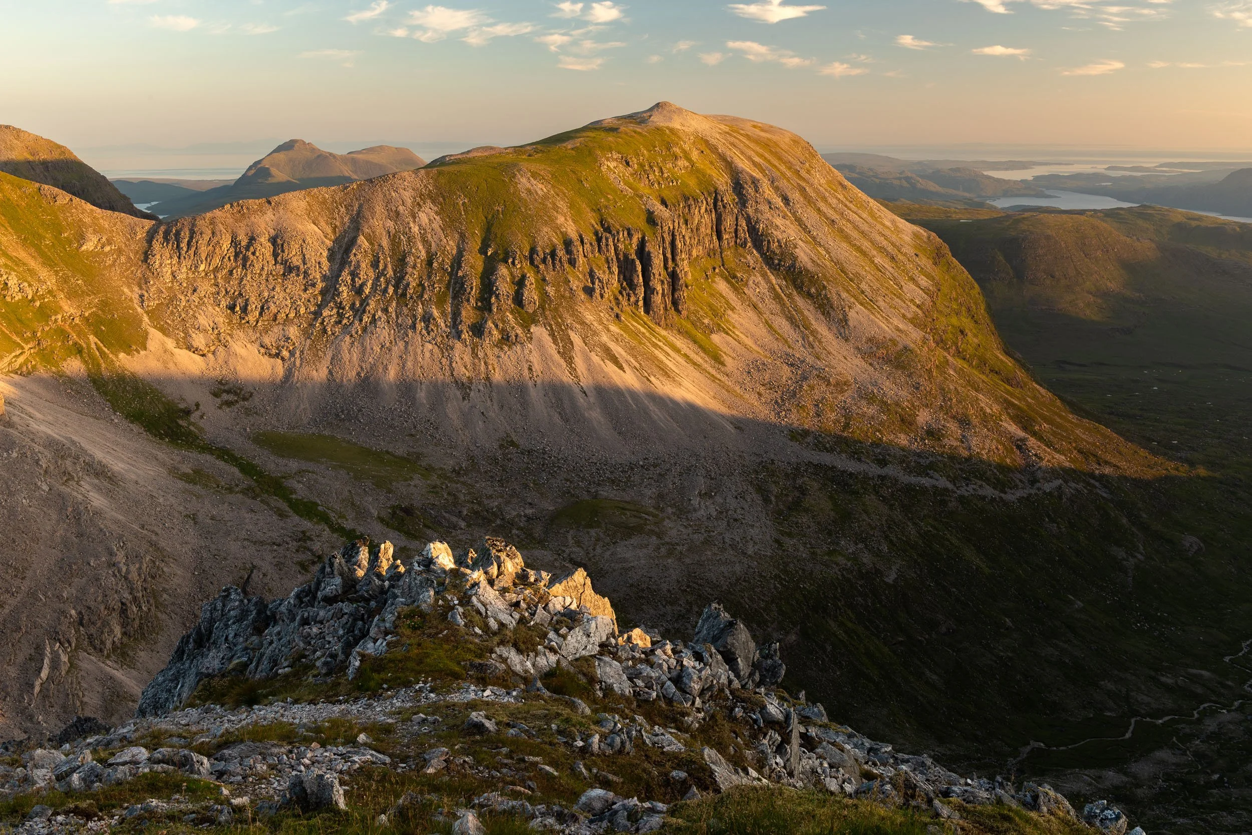 Dawn light on Ruadh-stac Mòr in Beinn Eighe National Nature Reserve, Scotland. Image © Colin Henderson Photography. Permission required before use. To license this image, please contact me quoting the file reference, size required and your planned en