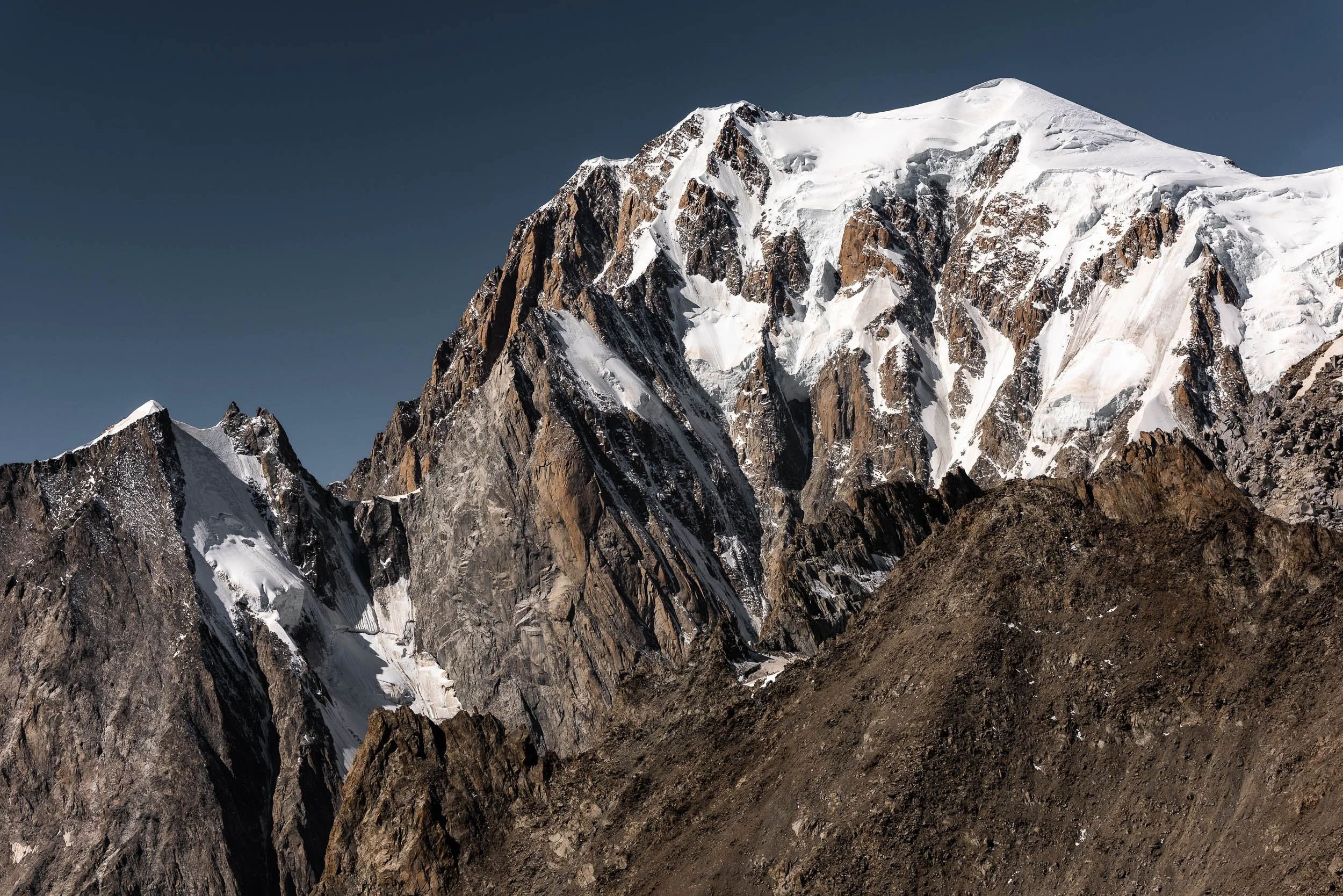Col de Peuterey, Grand Pilier d'Angle and the Brenva face on Mont Blanc de Courmayeur from Pointe Helebronner in Italy.