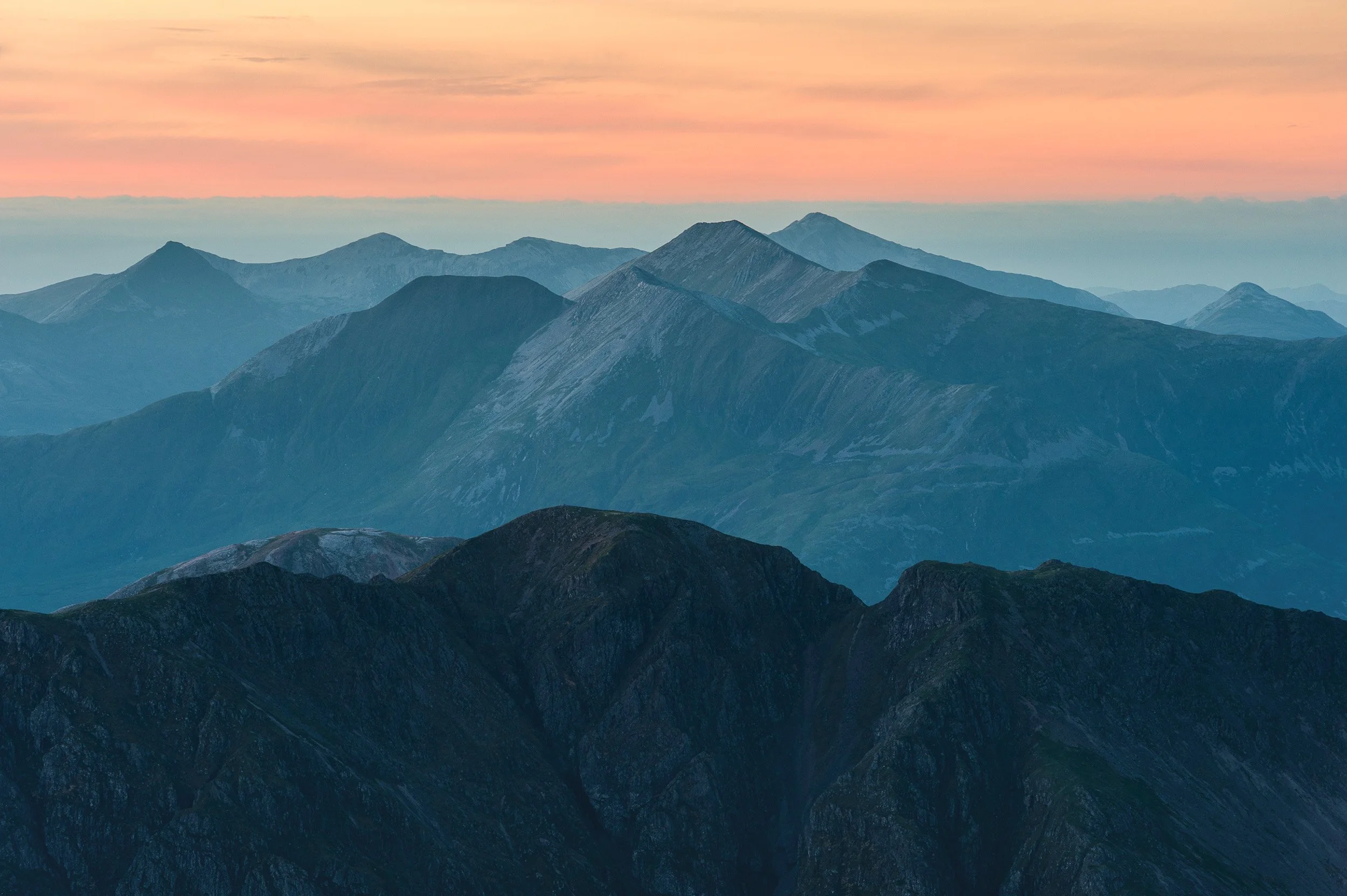Na Gruagaichean and Binnein Mòr in the Mamores at dawn, Scotland