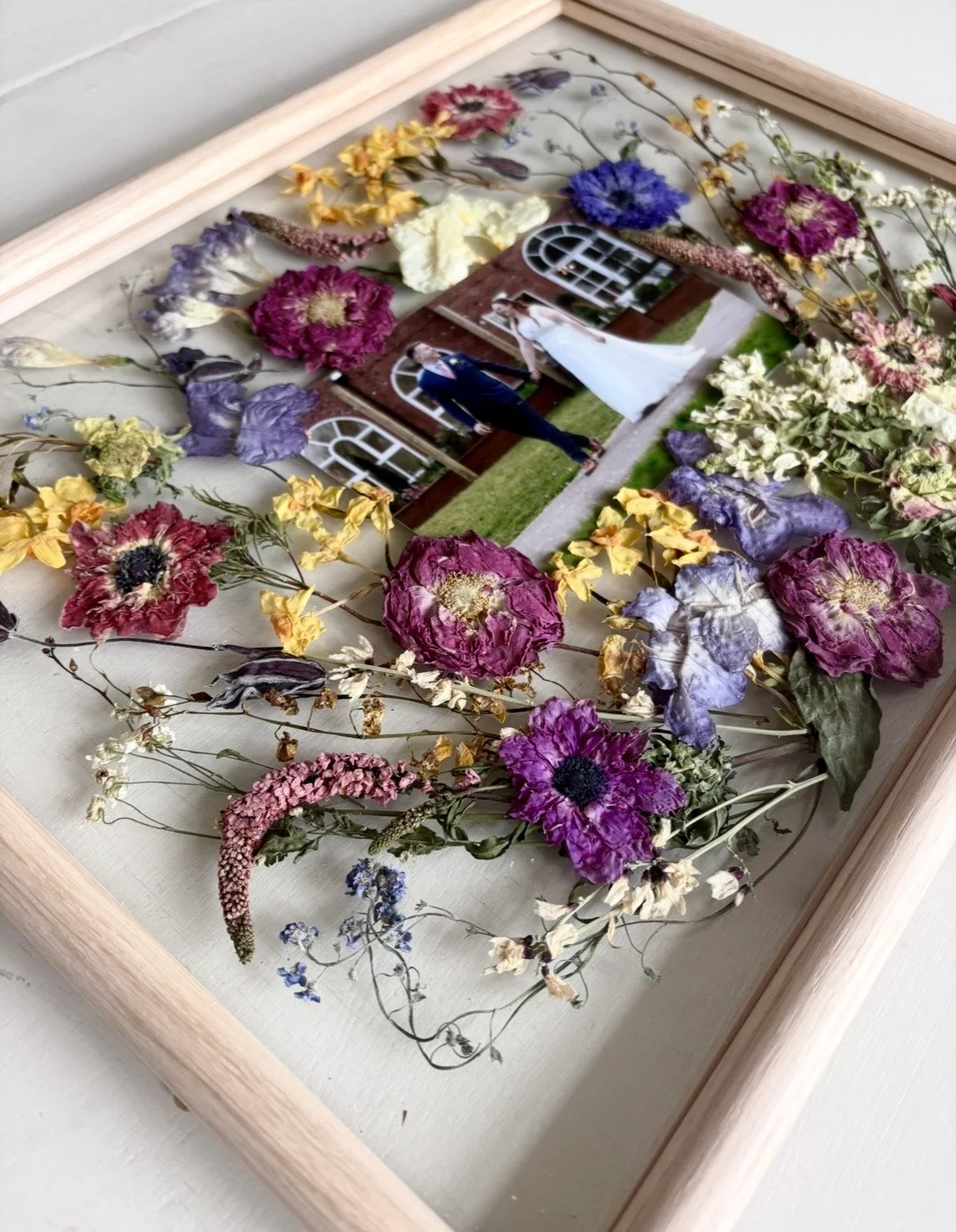 Pressed wedding flowers and photo,vows .jpg