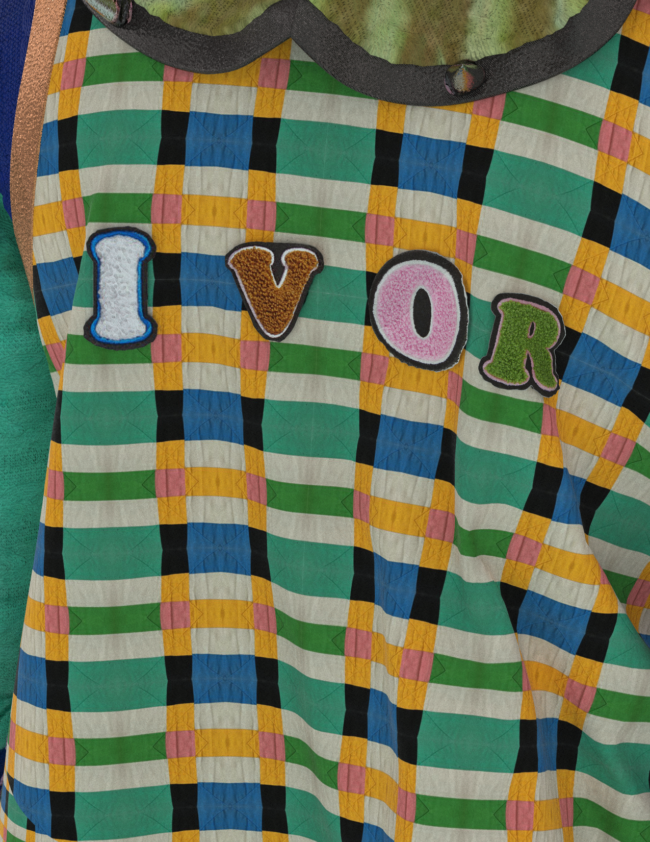 Close up view of Ivor letter patches on back of Babylandia garment
