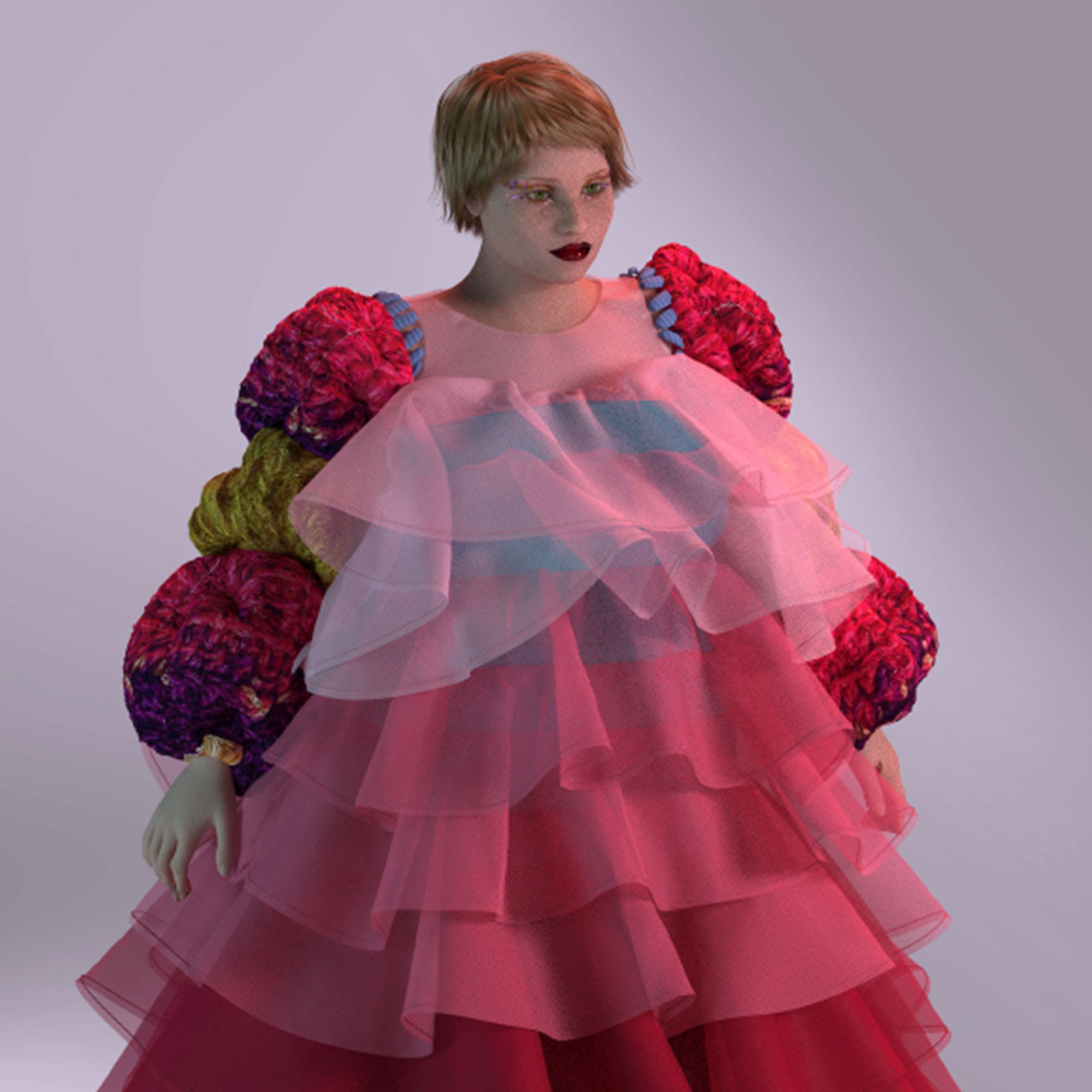 A woman wearing a layered pink tulle dress with puffed multicolored sleeves and a sheer top standing against a plain background.