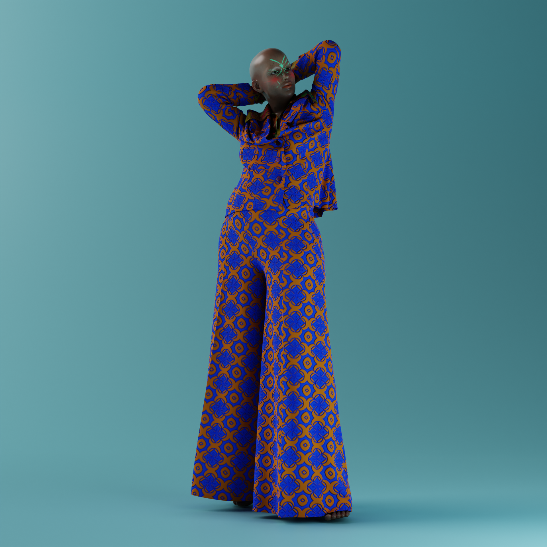 Model with a bald head and futuristic makeup wearing a matching blue and orange patterned outfit with wide-leg pants and a top, standing against a plain teal background with arms raised behind head.