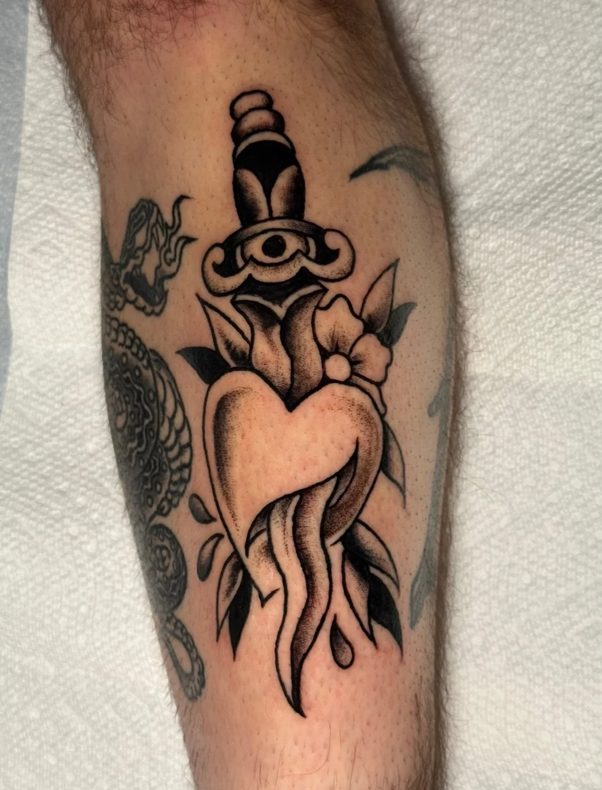 Adding to Karim&rsquo;s leg! He dropped in that morning, we threw around some ideas and looked through some reference books and flash, then pulled this sharp thang together 🗡️ 🖤 appreciate the time and trust, next session soon!