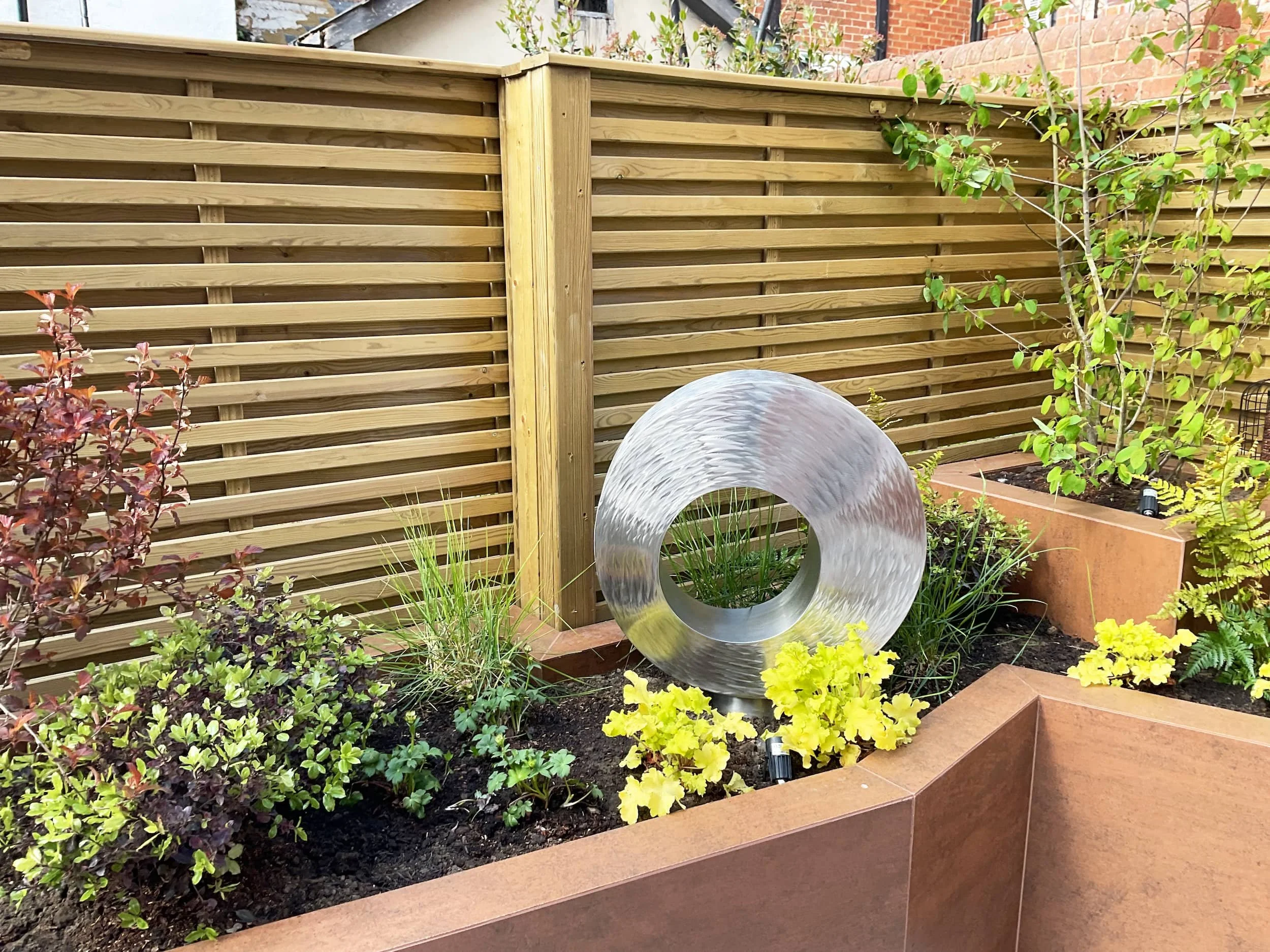 orbital-stainless-steel-garden-sculpture-10.jpg