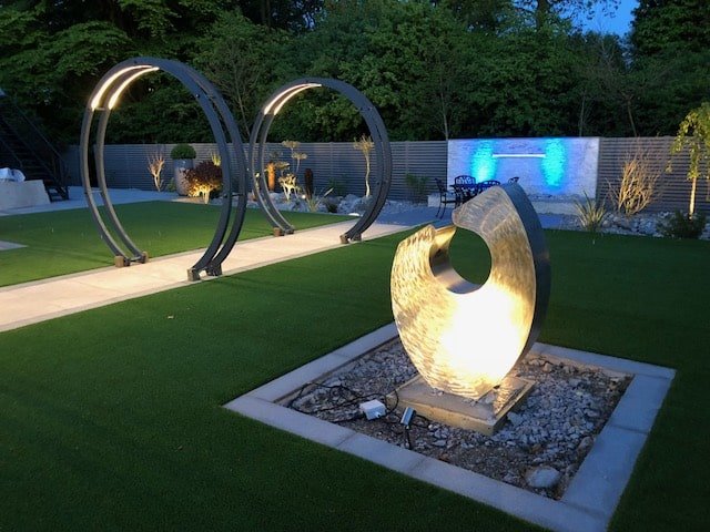 enigma-stainless-steel-garden-sculpture-night.jpg