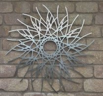 solaris-stainless-steel-garden-sculpture.jpg
