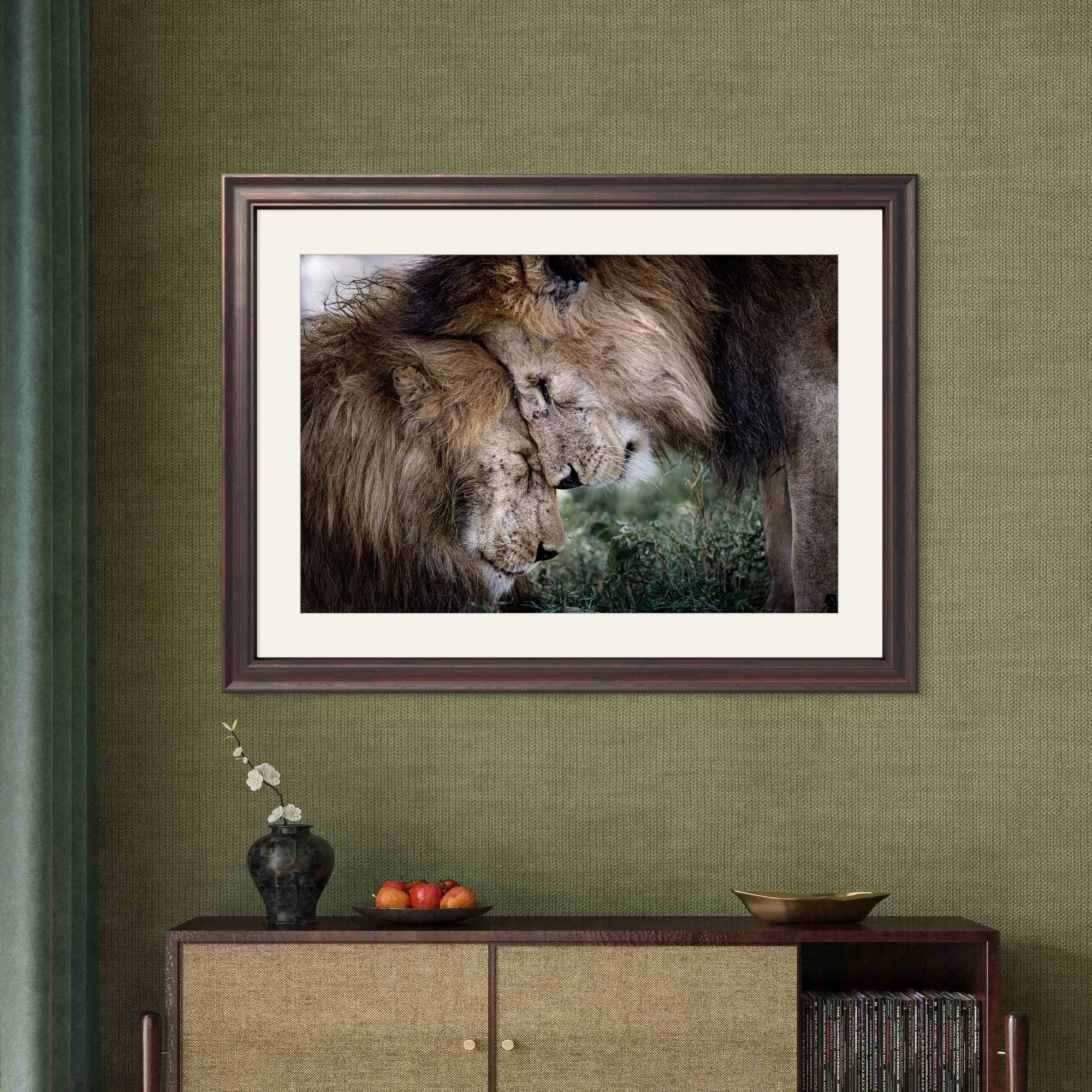 A photograph of two lion brothers in an elegant frame