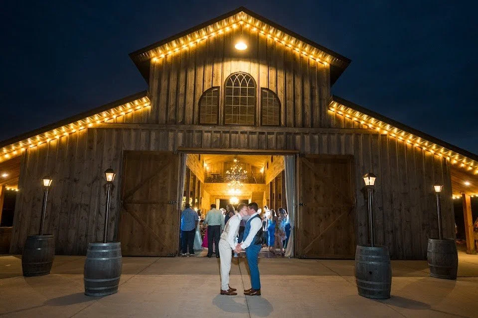 Ange & Chuck Wedding Exterior Kiss.jpg