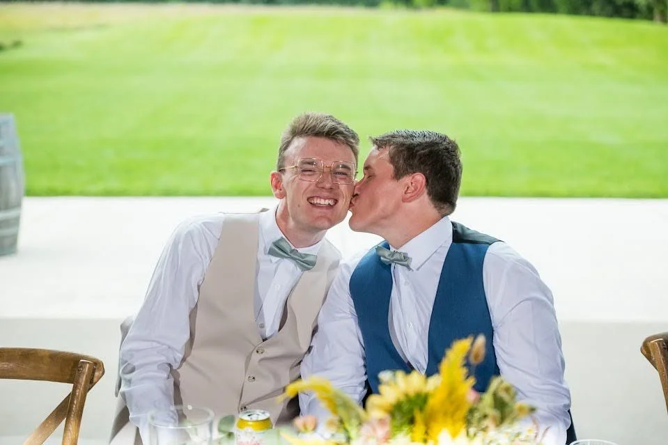 Ange & Chuck Wedding Kiss on Cheek.jpg