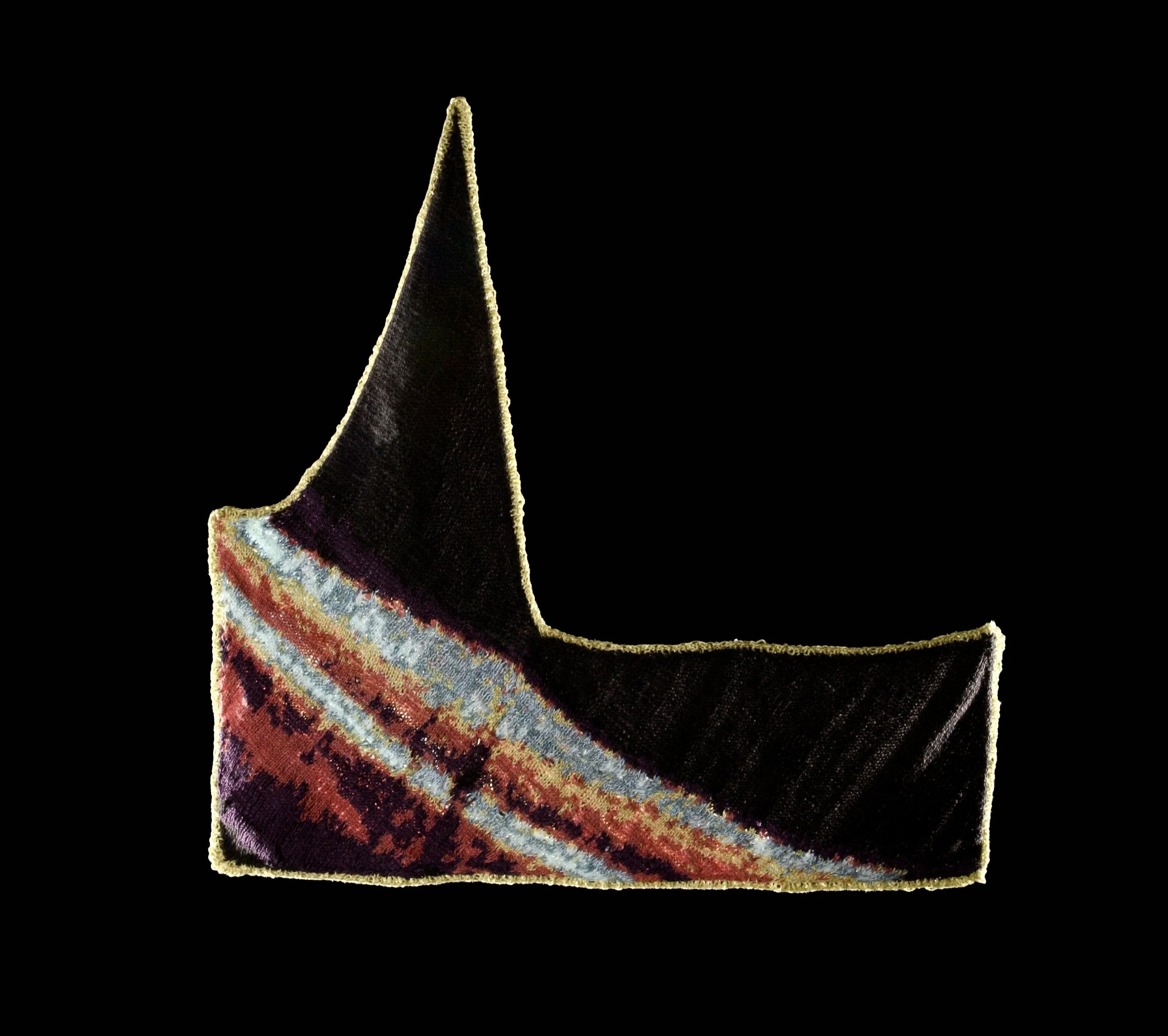 "Eye 1." Fairisle knit of a scan of my eye. Using up-cycled yarns including naturally dyed yarns from past projects. Knit on size #1 needles. Based on a skirt pattern from a 1929 Vionnet Dress from Patterns of Fashion Volume 2.