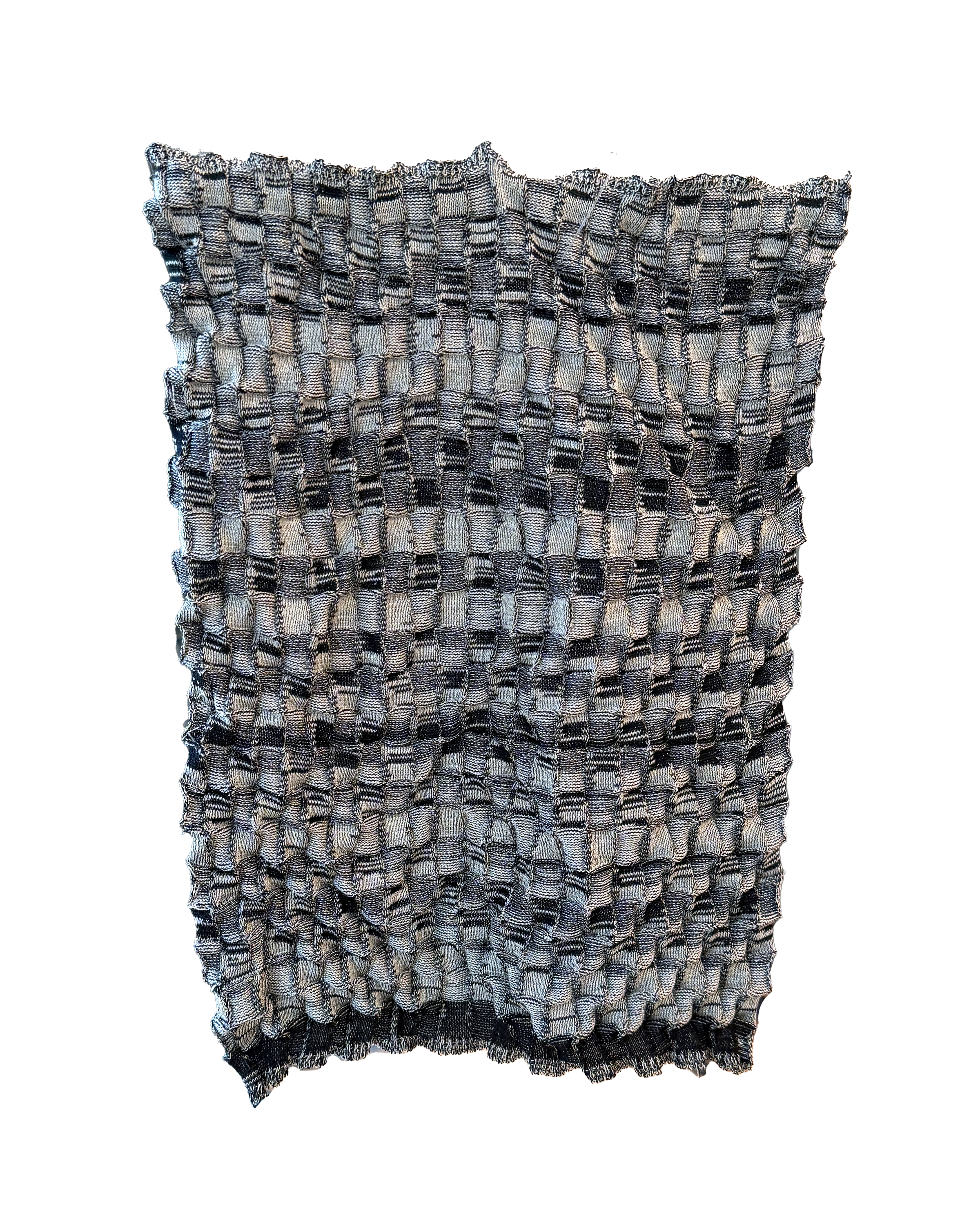 "Checkers." Silk/Cotton yarn with a navy wool knit together with a silver lurex plaiting. Hand manipulated transfers from front to back bed every 15 rows. Knit on a 12gg Dubied Machine.