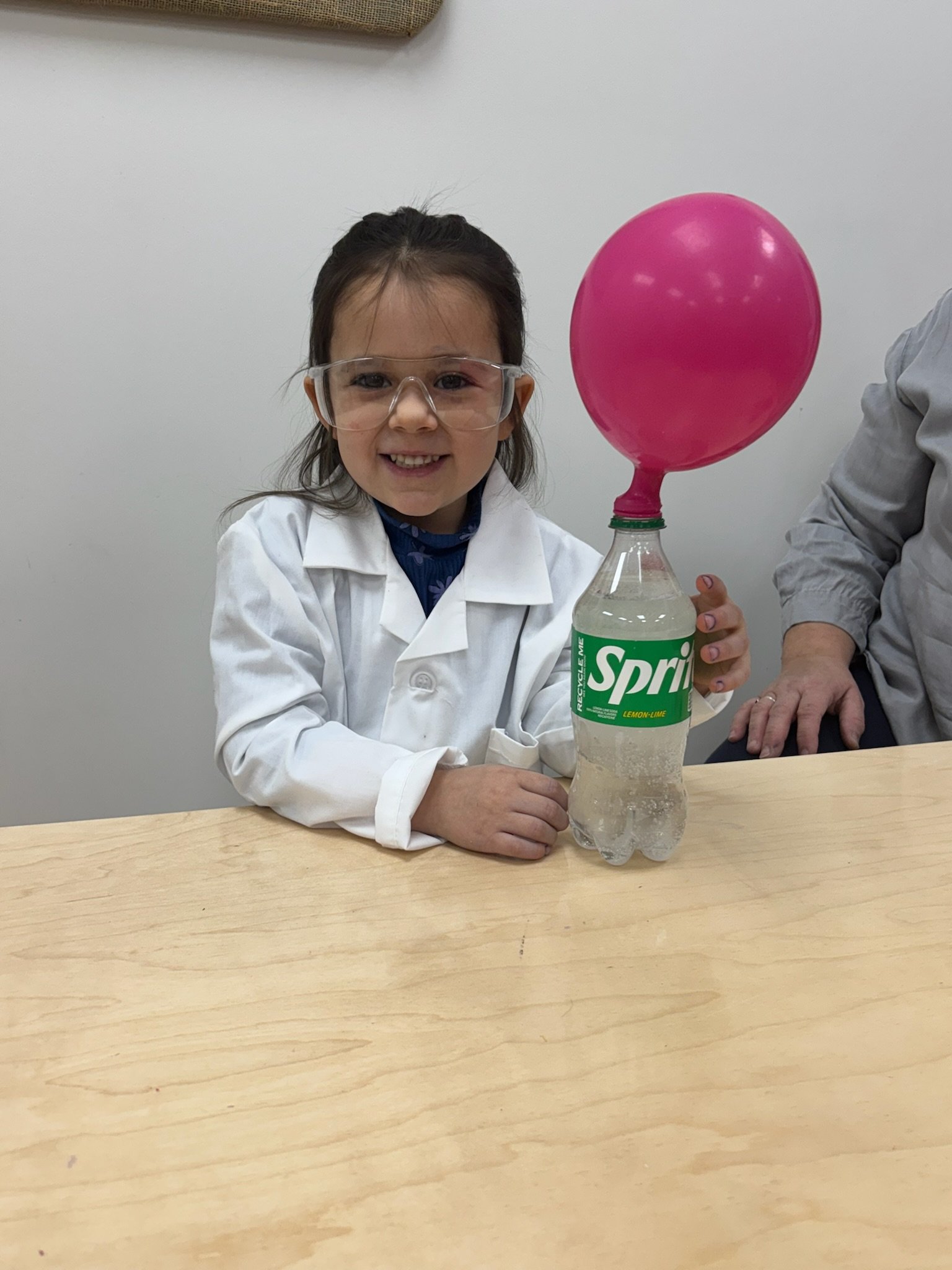 Little girl with balloon experiment