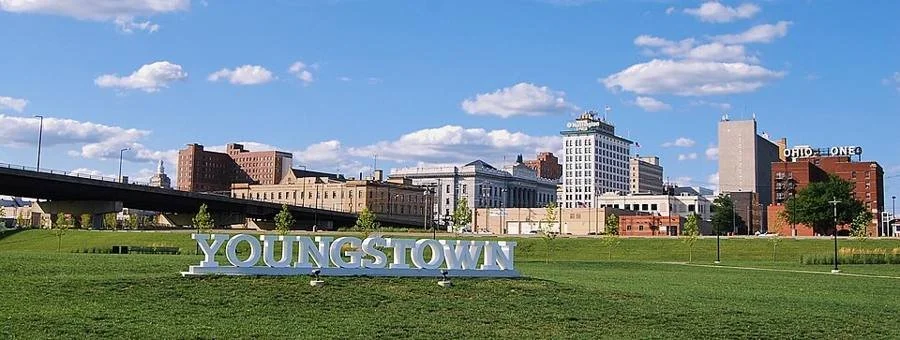 Downtown Youngstown skyline seen from Wean Park, with the YOUNGSTOWN letters on the lawn