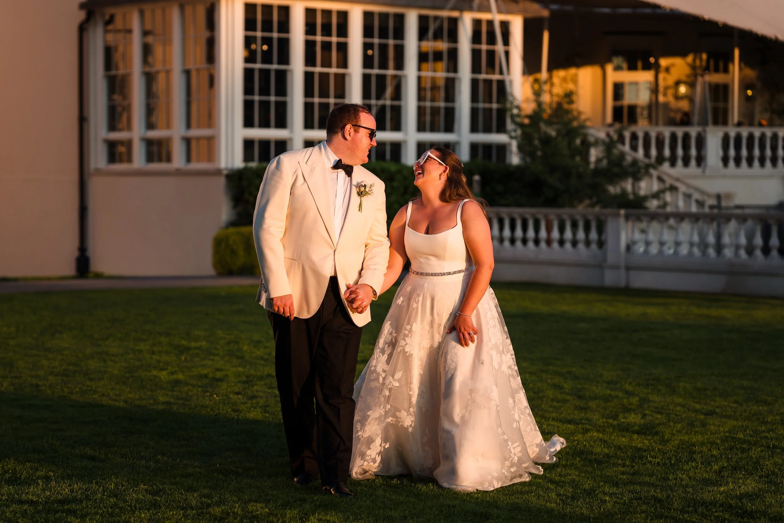 Relaxed sunset couple portrait at a Coworth Park wedding in Ascot, captured with natural light and elegant tones.