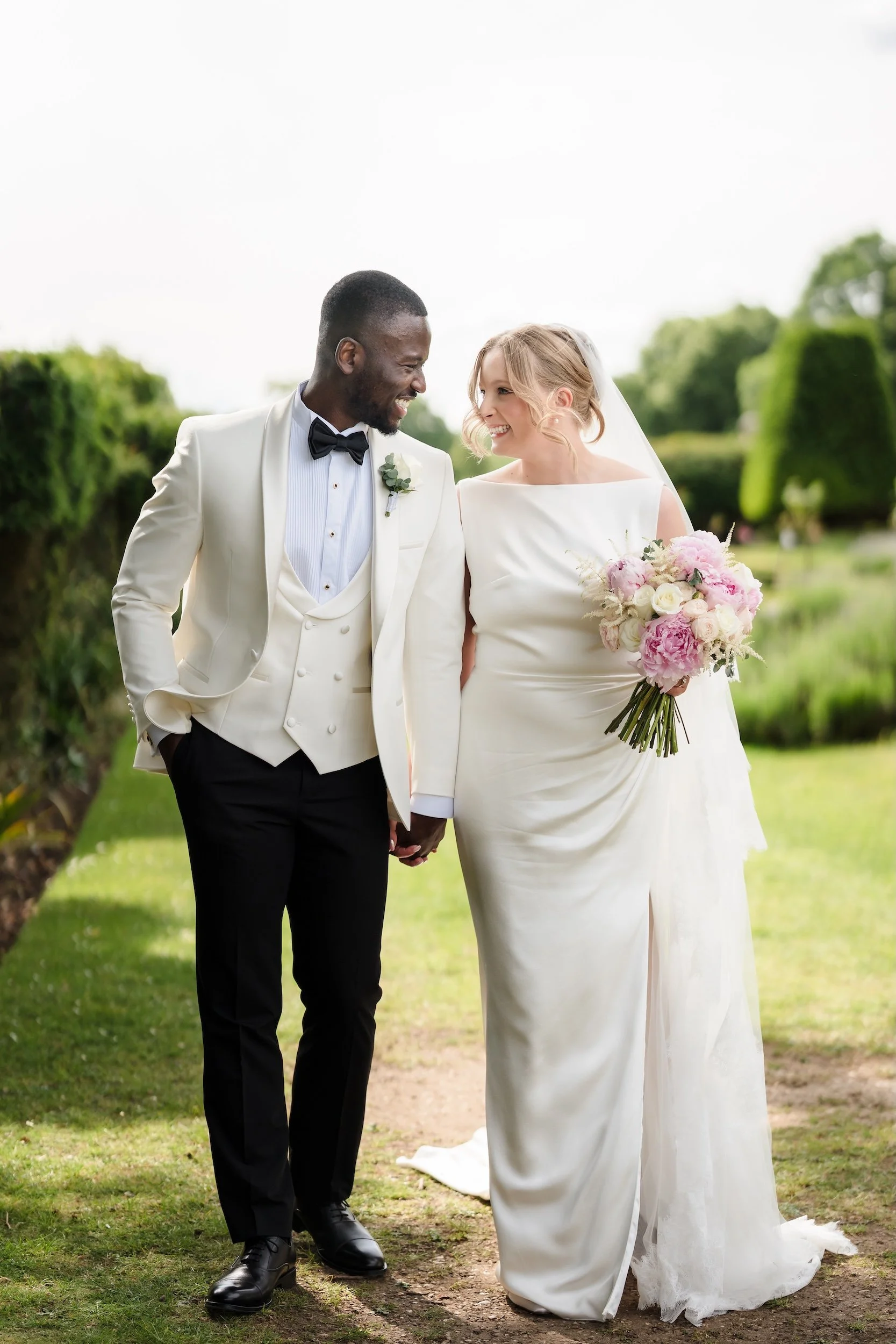 Bride and Groom walking portrait wedding Danesfiled house.jpg
