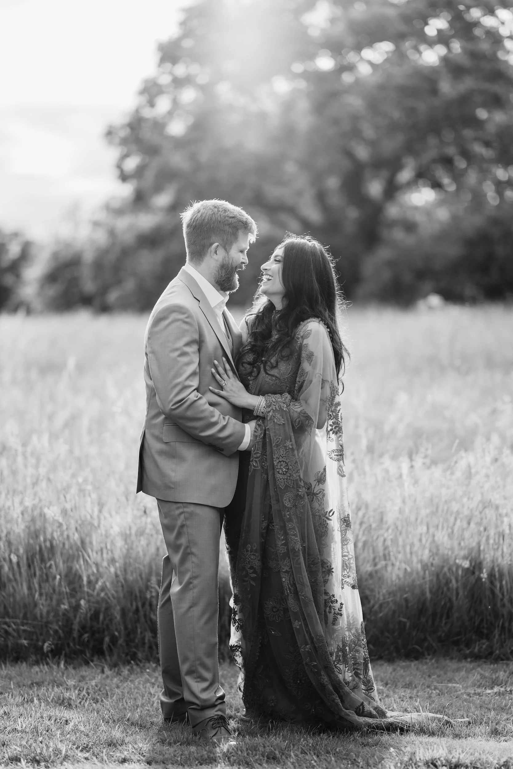 Bride_Groom_Laughing_Sunset_Indian_English_wedding.jpg