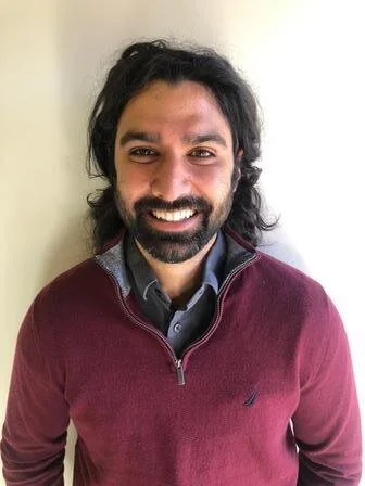 Sami Roe, small business specialist, has been thinking constantly about  the barriers presented to refugee entrepreneurs and enthusiastically  shared his perspectives.  Photo: Tatjana Andrews/IRC
