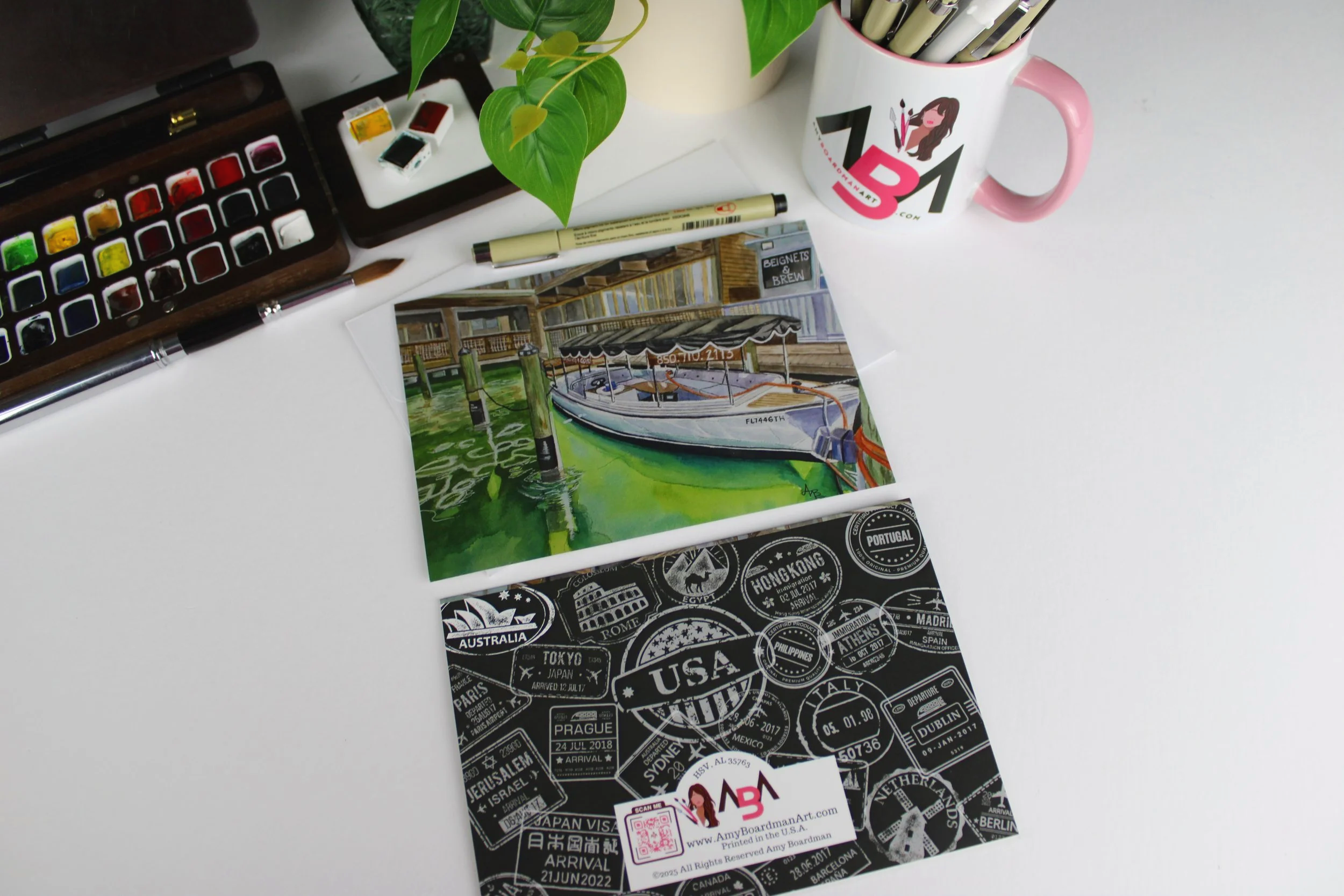 Front & Back View of 'Tides of Solitude' 5x7 nautical watercolor greeting card of a coastal docked boat and waterfront eatery by Amy Boardman Art.
