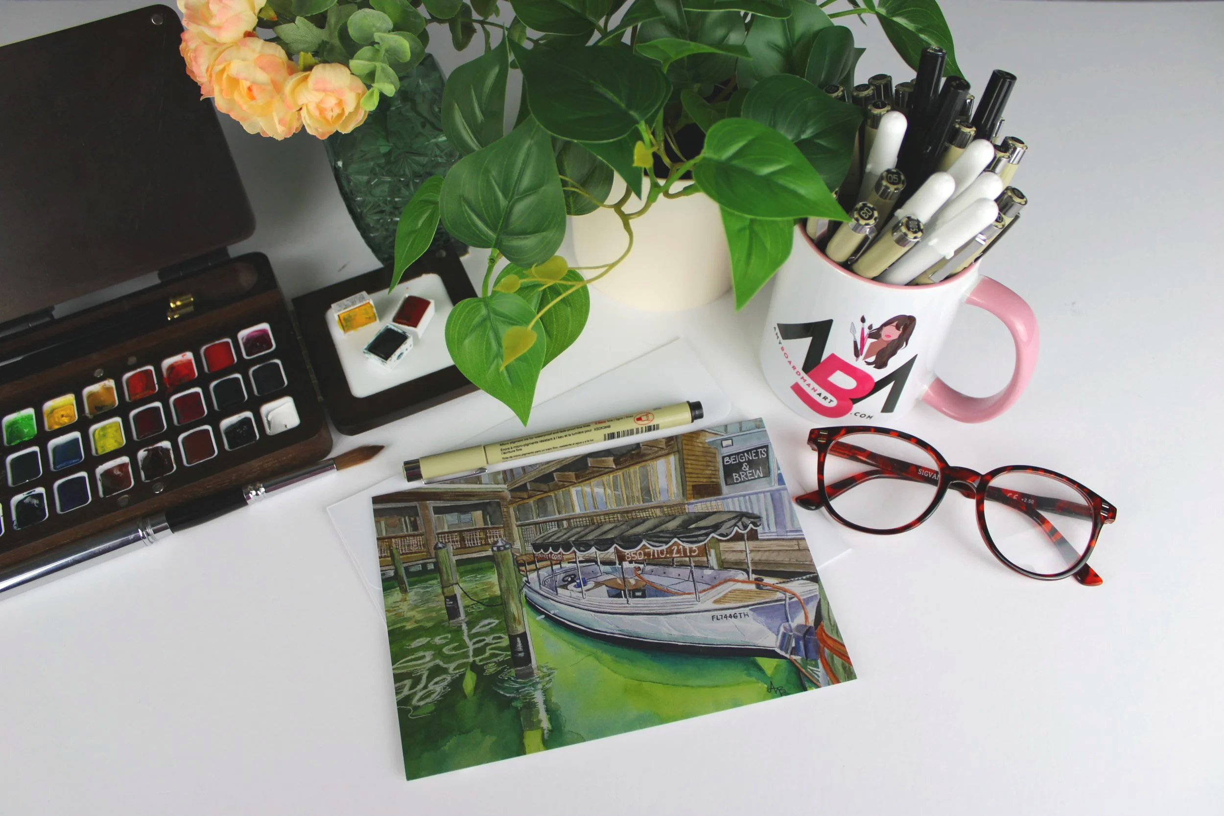 'Tides of Solitude' 5x7 nautical watercolor greeting card of a coastal docked boat and waterfront eatery by Amy Boardman Art.