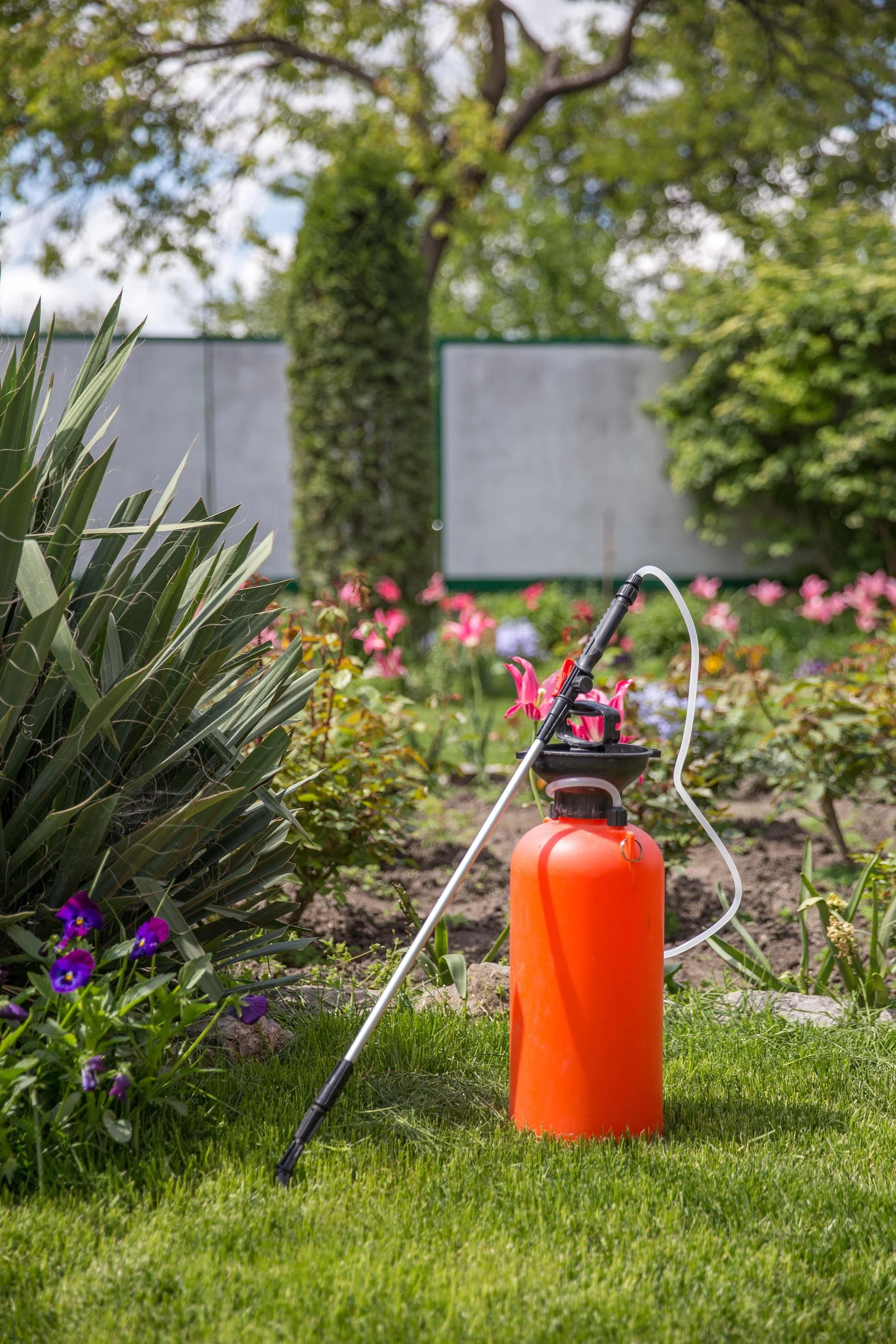 Orange spray unit on grass