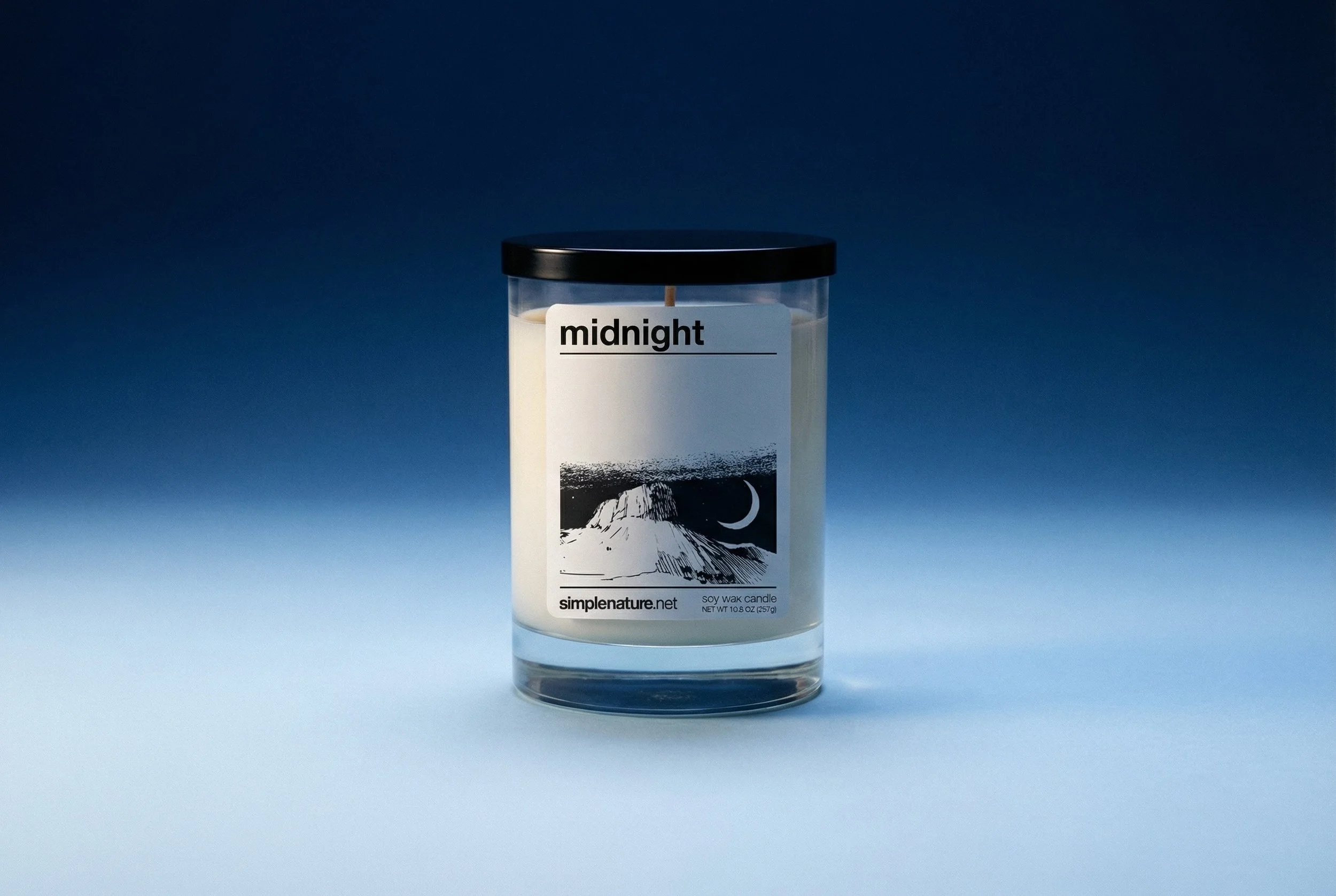 Midnight-soy-wax-candle-blue-background-2.jpeg