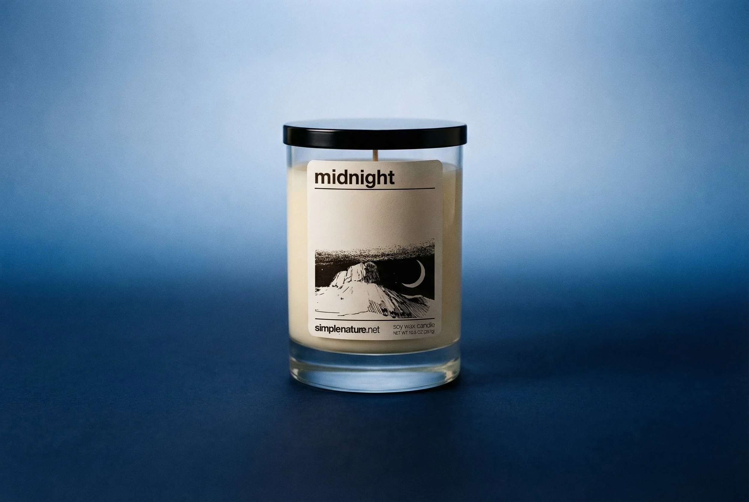 Midnight-soy-wax-candle-blue-background-4.jpeg