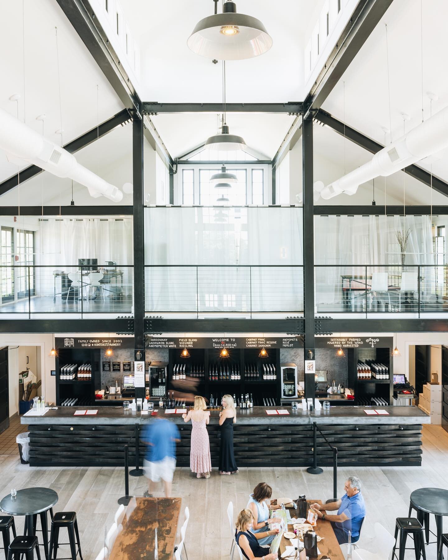 Kontokosta Winery on the North Fork of Long Island was designed with modernizing the idea of a traditional barn structure with blackened steel beams and contrasting white interior. 

@kontokostawinery 
📸 by @c.fenimore 

#northforkliving #interiorde
