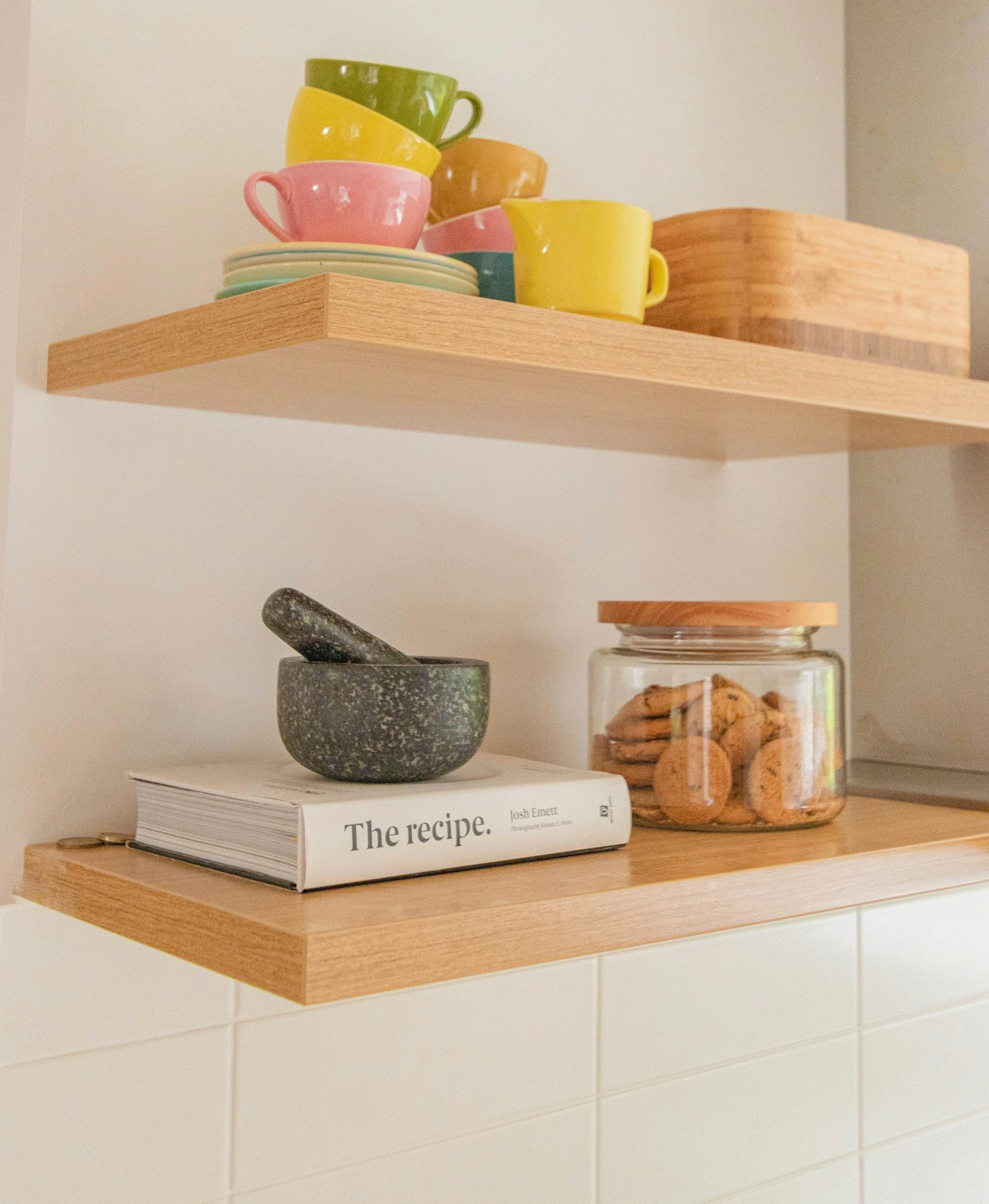 Open shelves in decluttered kitchen.