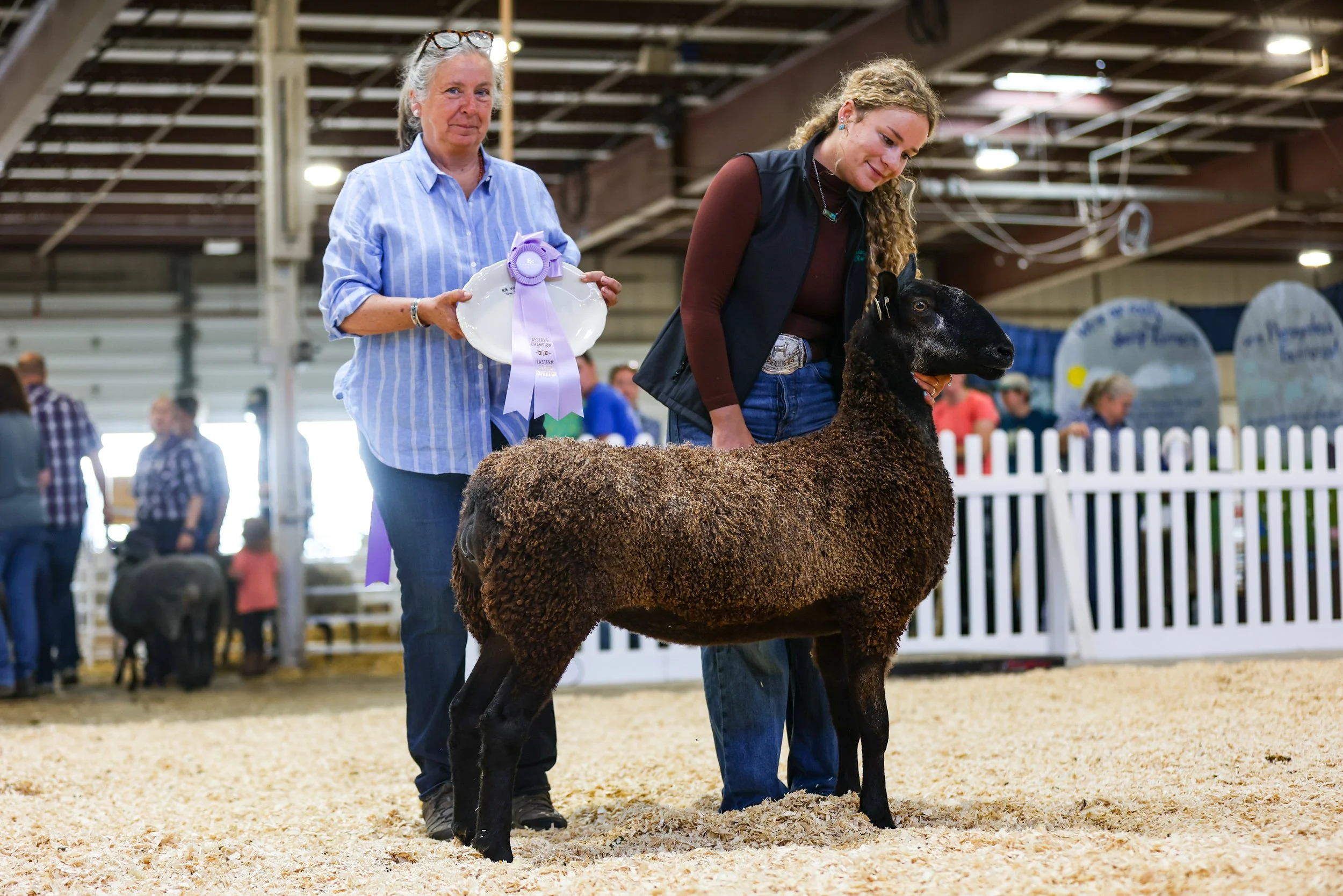  Stephanie and the Reserve Champion Bluefaced Leicester at Eastern States Exposition. Photo credit KAK images. 