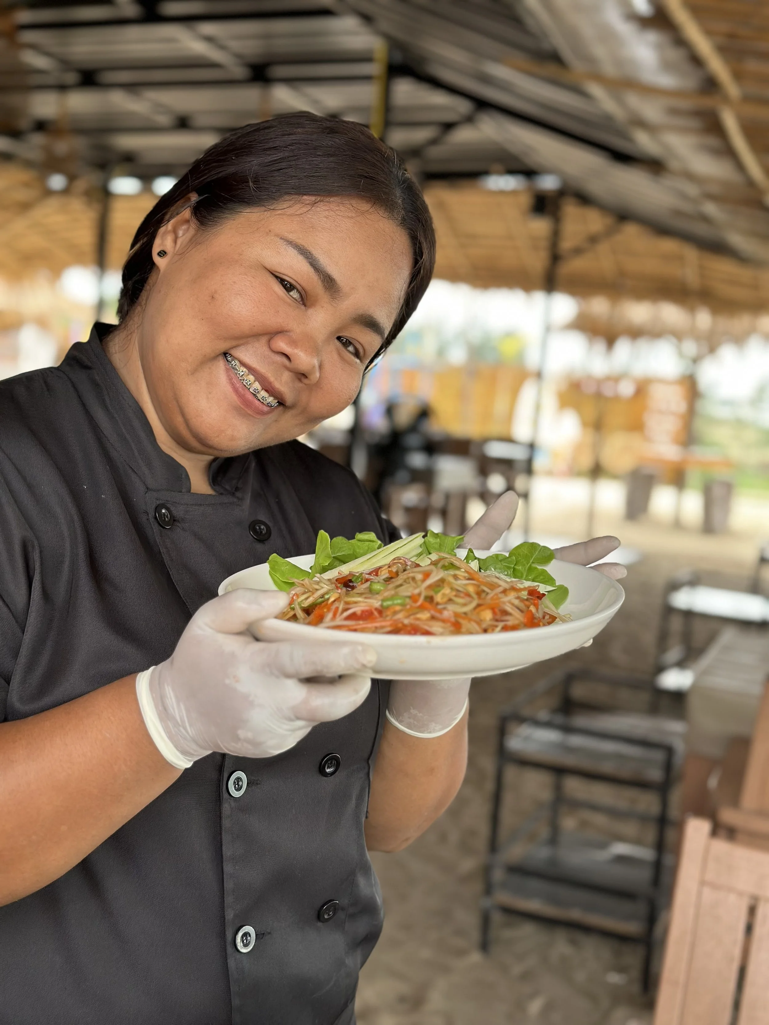 Chef at All Day's with Papaya Salad