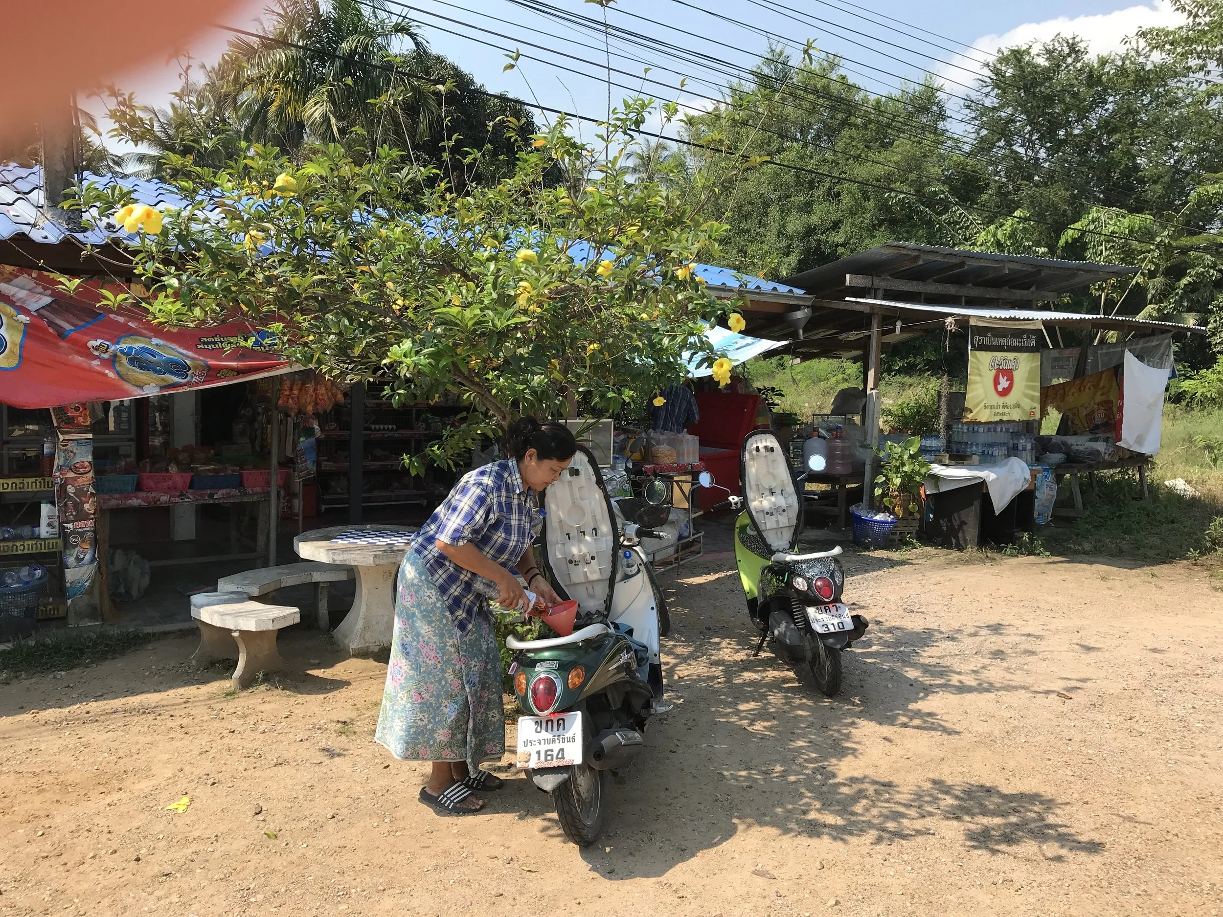 Filling up the tank on the countryside
