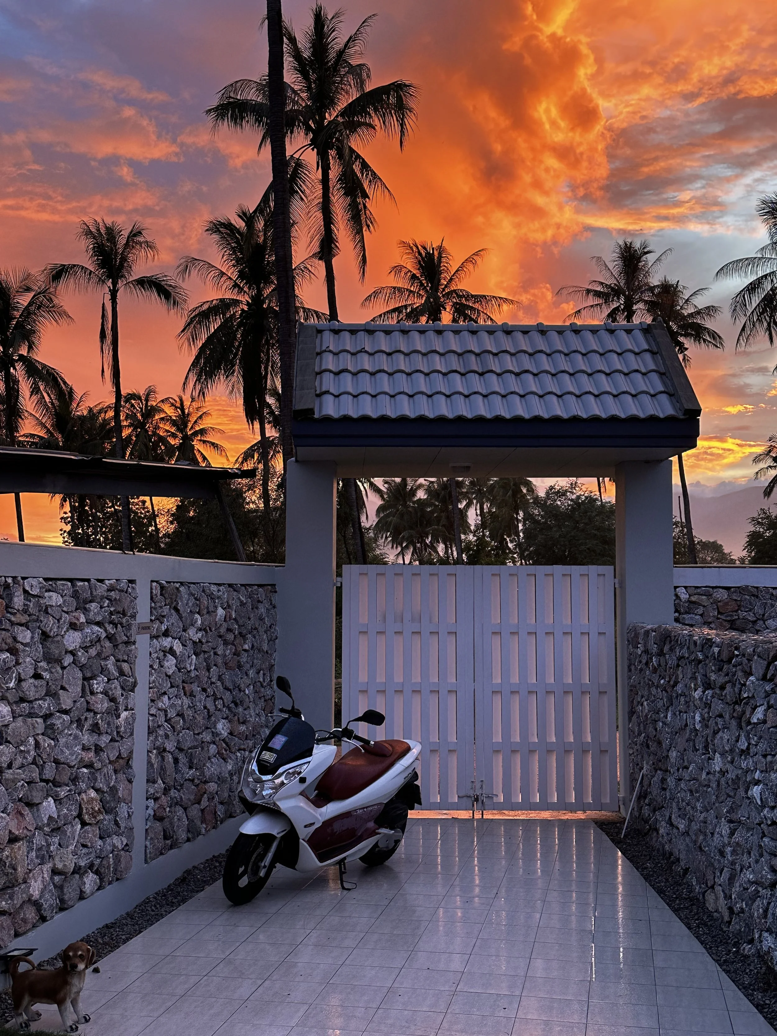 Sunset and scooter in Huay Yang Thailand
