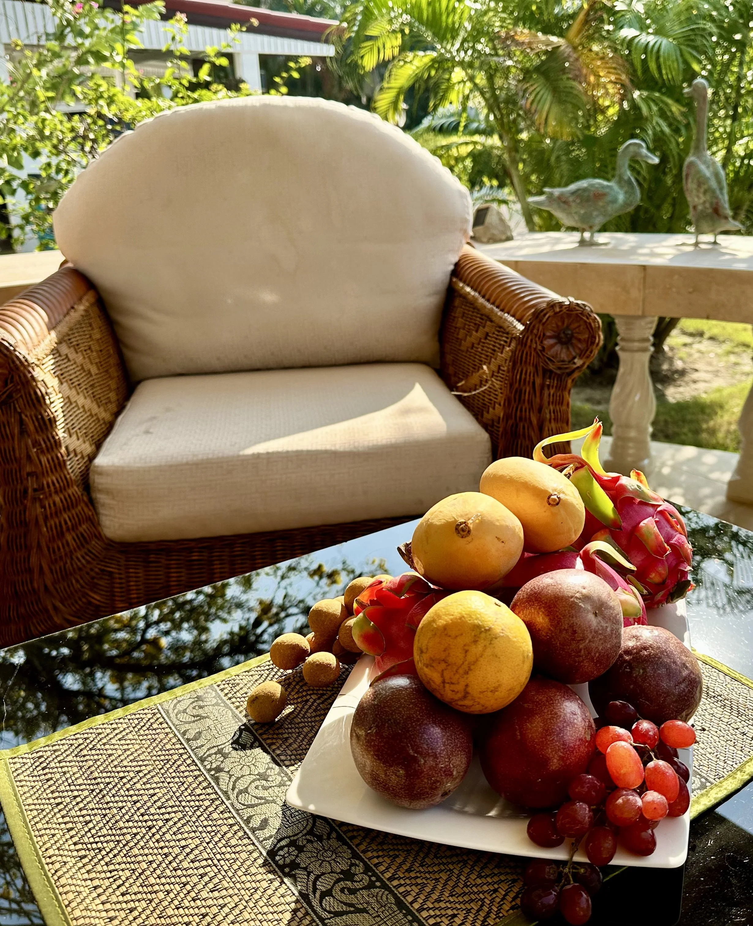 Thai fruit in a bowl on a terrace