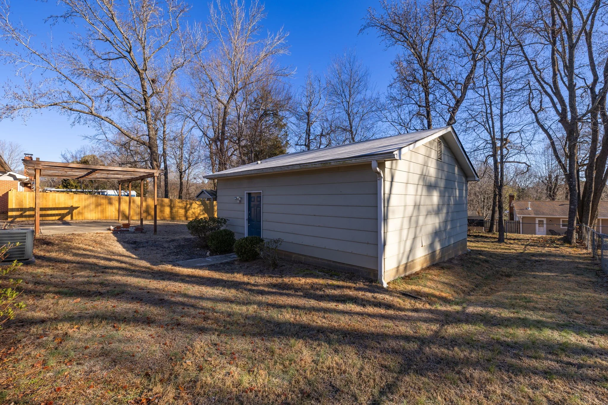 Driveway and rear access layout showing separation from main living space