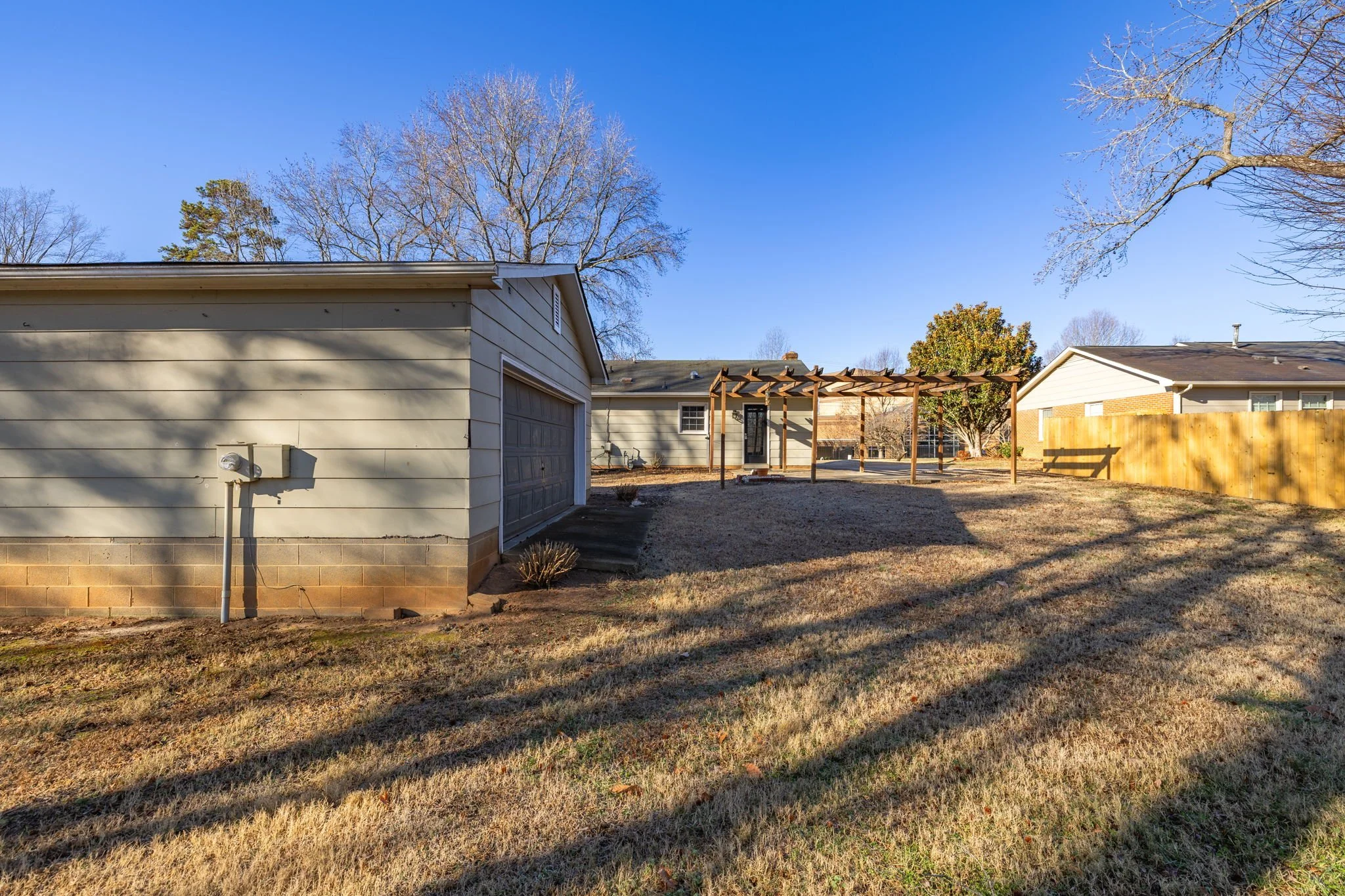 Detached two car garage providing valuable storage and parking