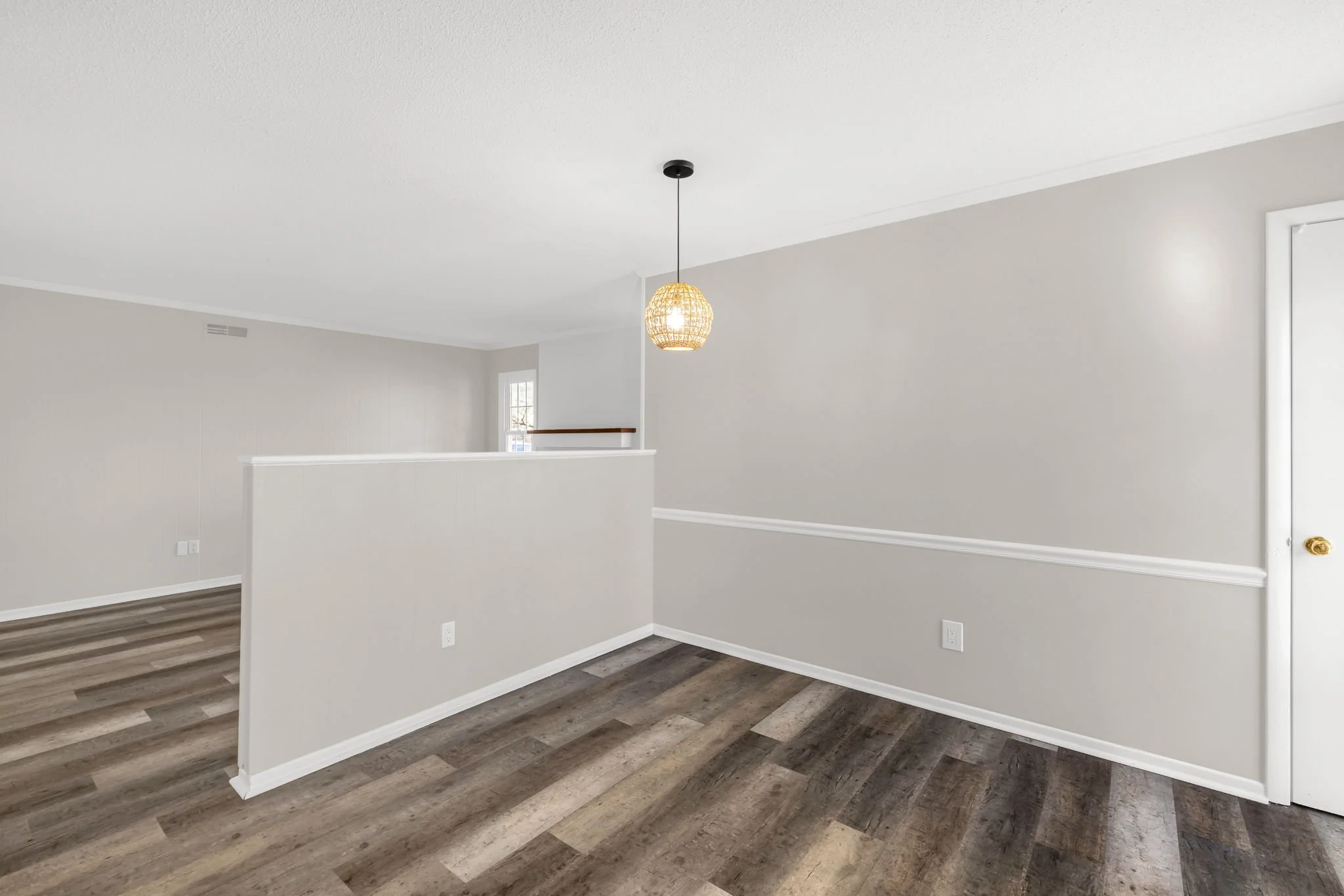 Eat in kitchen area with updated lighting for relaxed meals or conversation with the chef. 