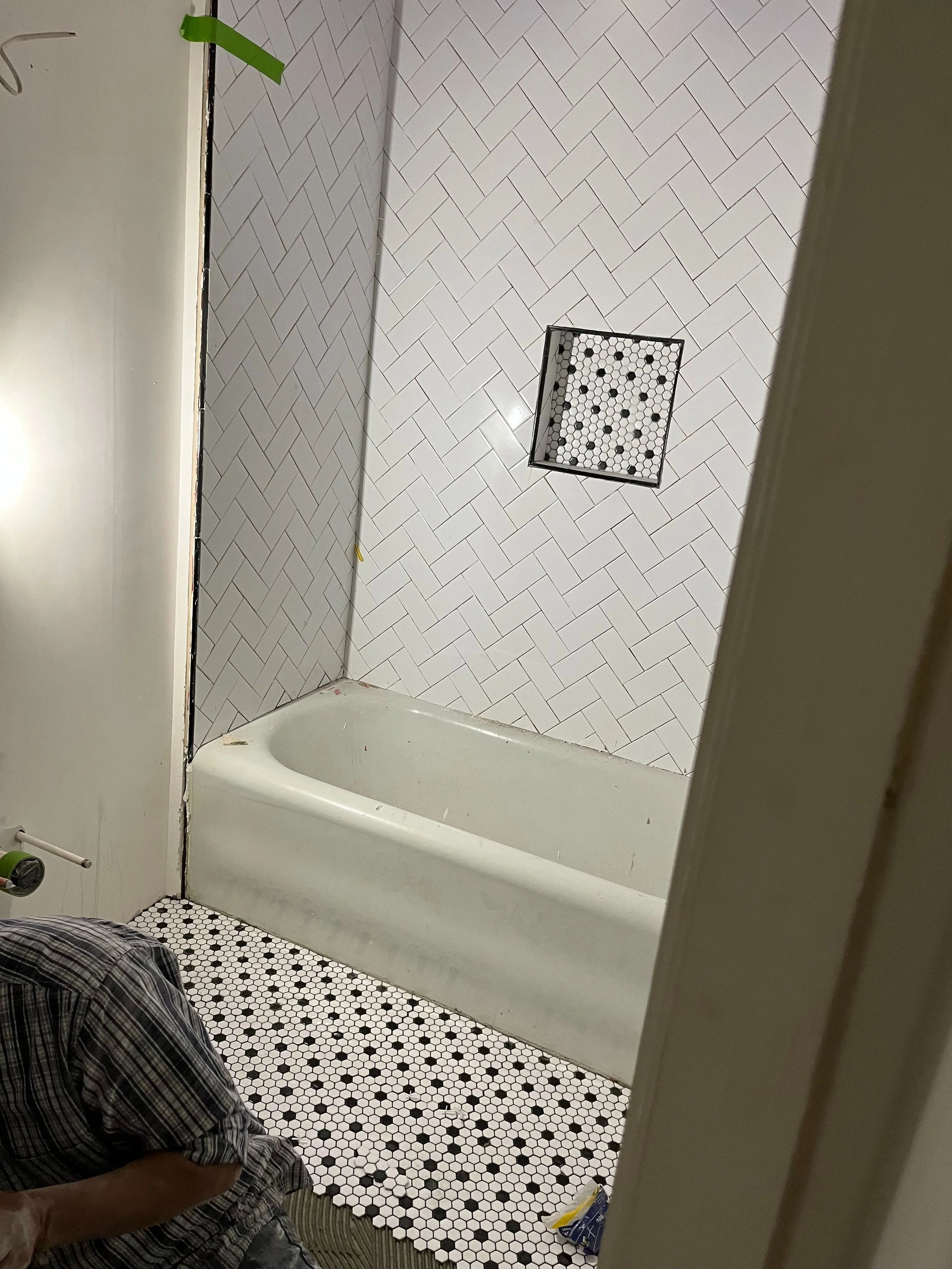  We are making some progress on the tile for the bathroom and I am getting really excited about how this looks. This salvaged tub will make it feel like this is just how the house was originally. There will be three different shower heads in this sho