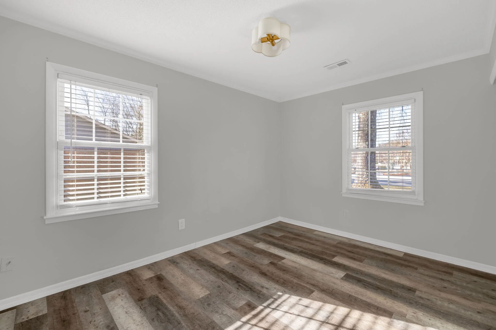 Additional bedroom offering closet space and natural light