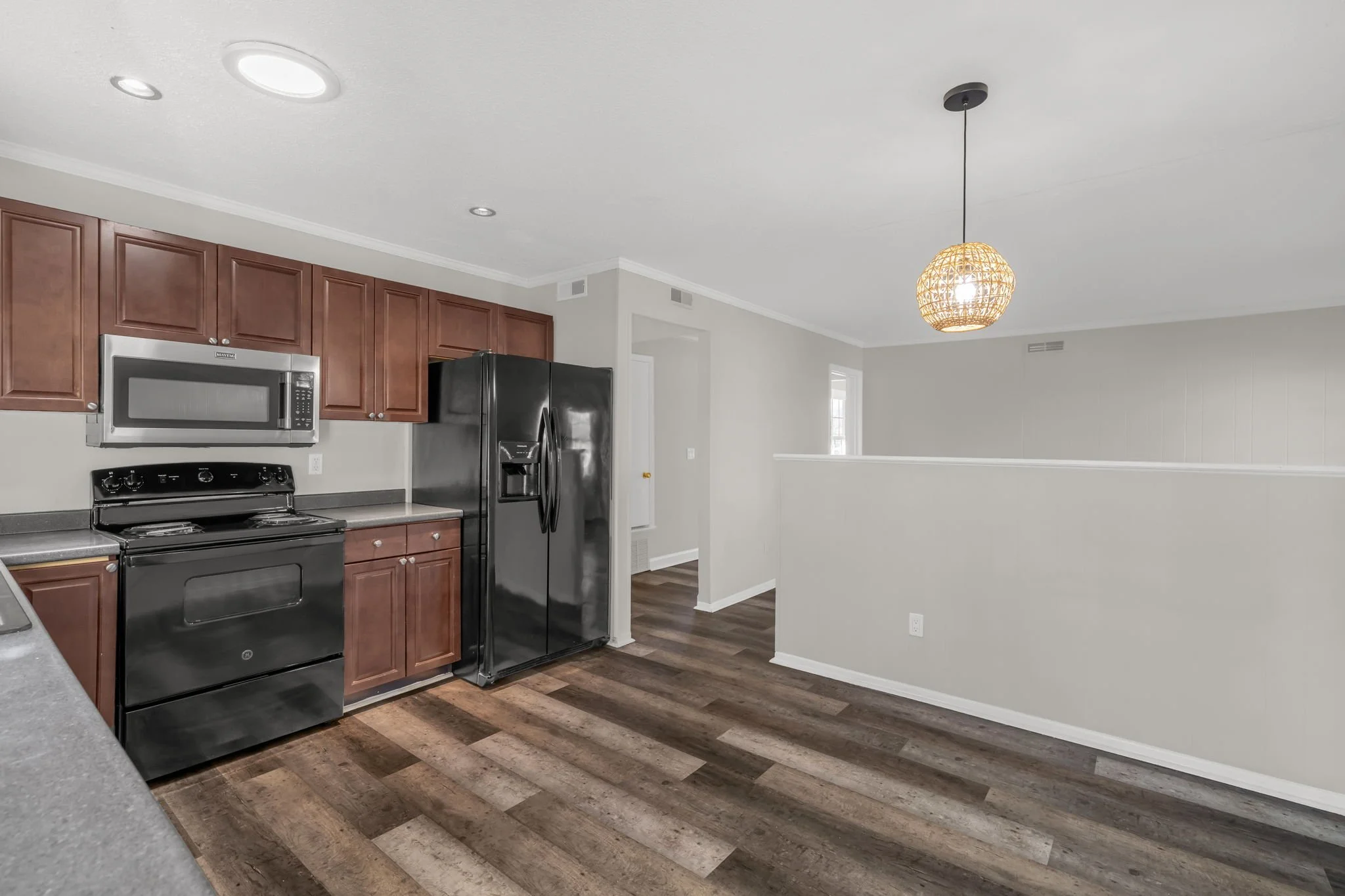 Updated kitchen workspace with room for meal prep and daily use