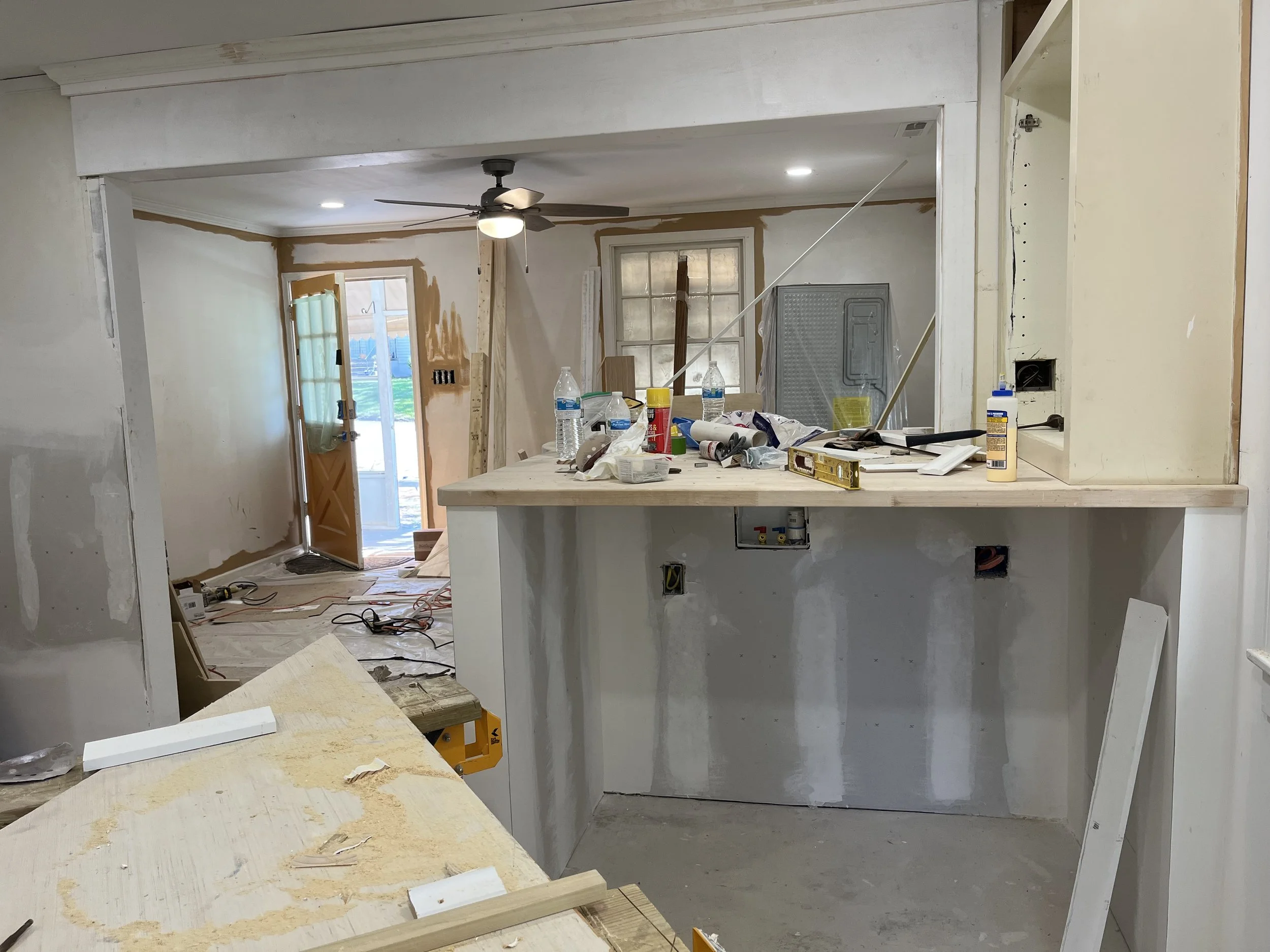  The kitchen side of the bar is where the washer and dryer will be.  