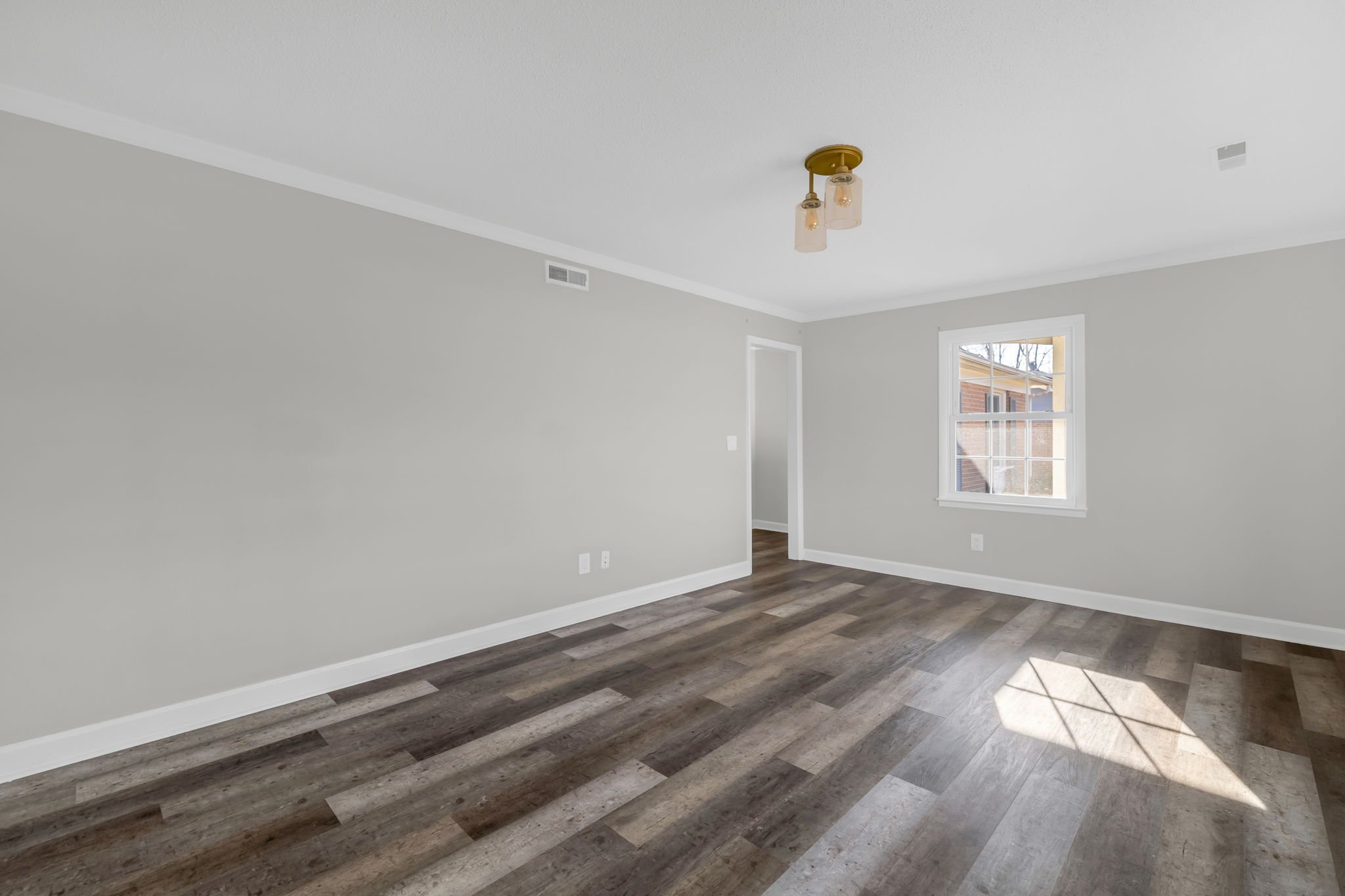 Spacious living area with flexible layout ideal for everyday living or entertaining