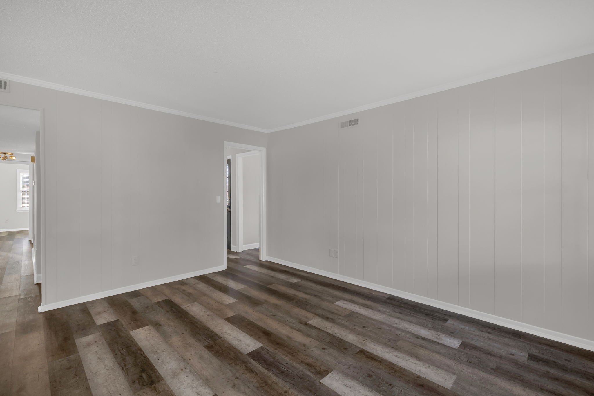 Den or Dining area with natural light conveniently located between living space and kitchen