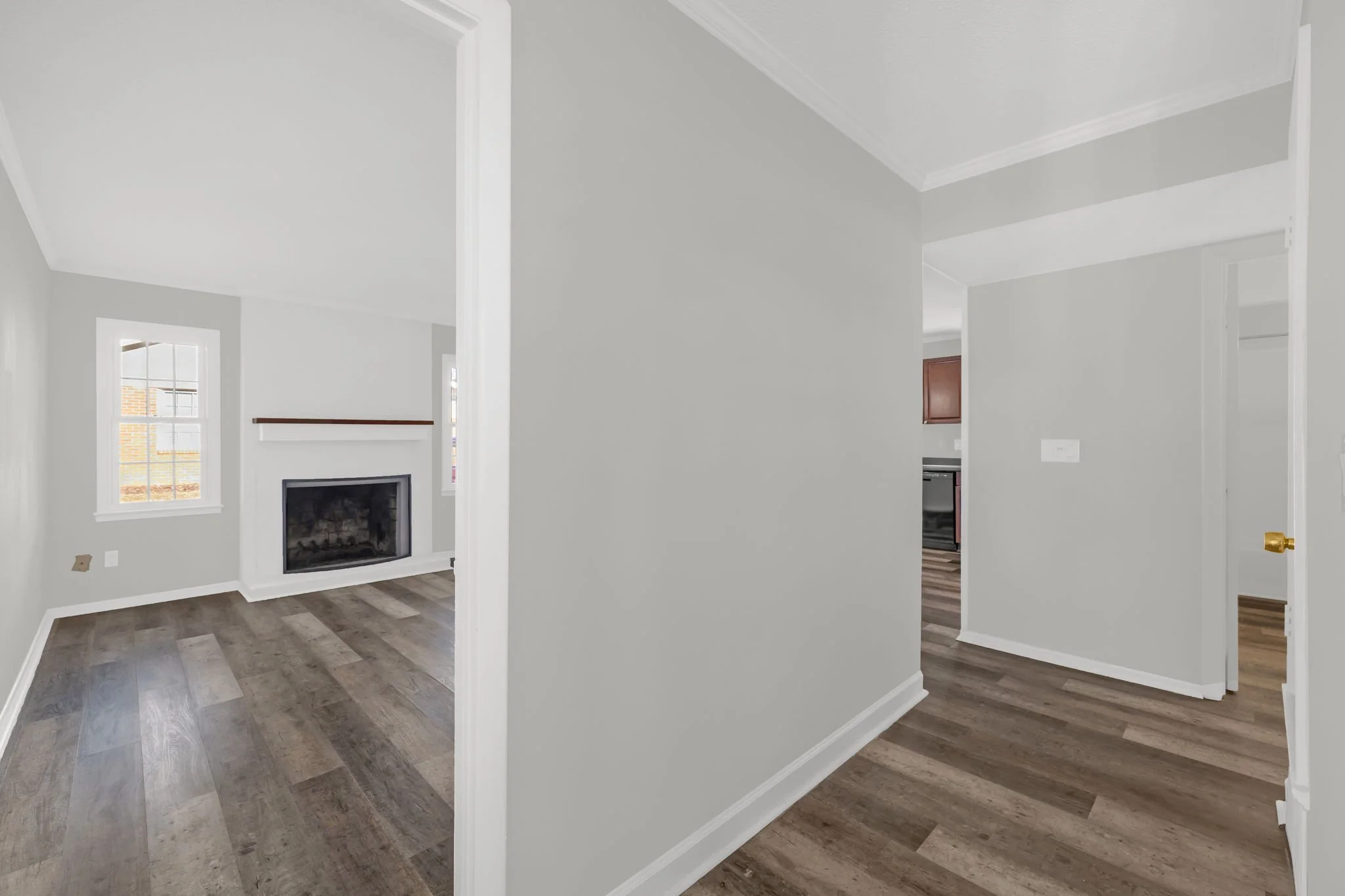 Den or Dining area with natural light conveniently located between living space and kitchen