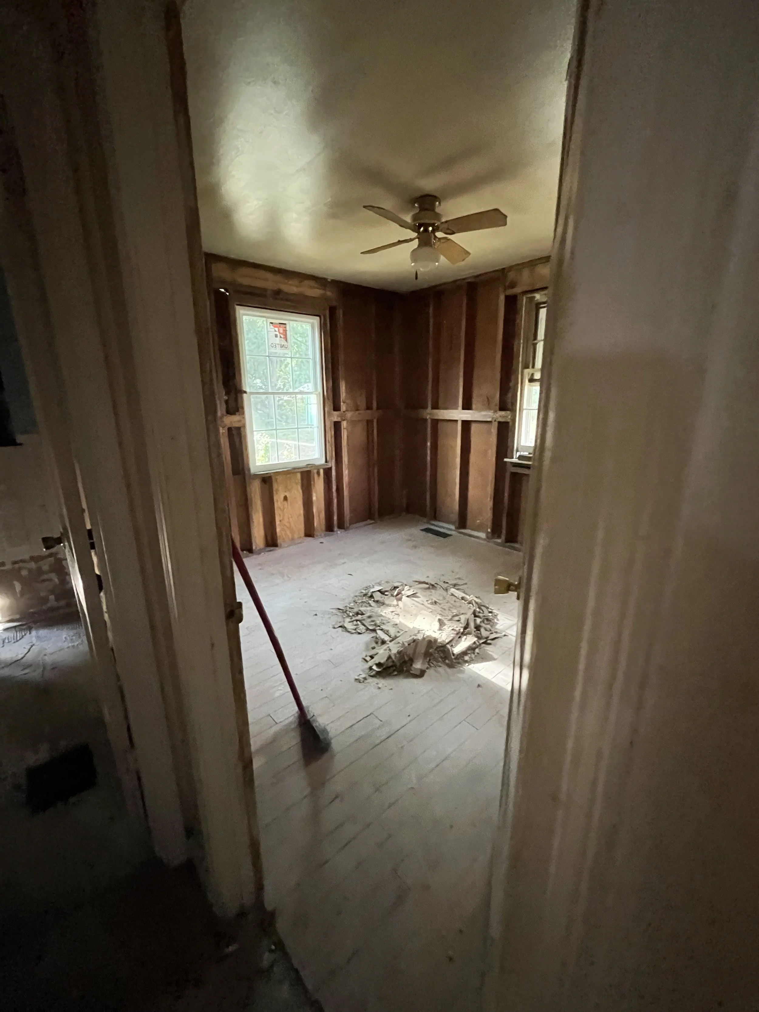  We removed the paneling that was on the walls in both bedrooms.  